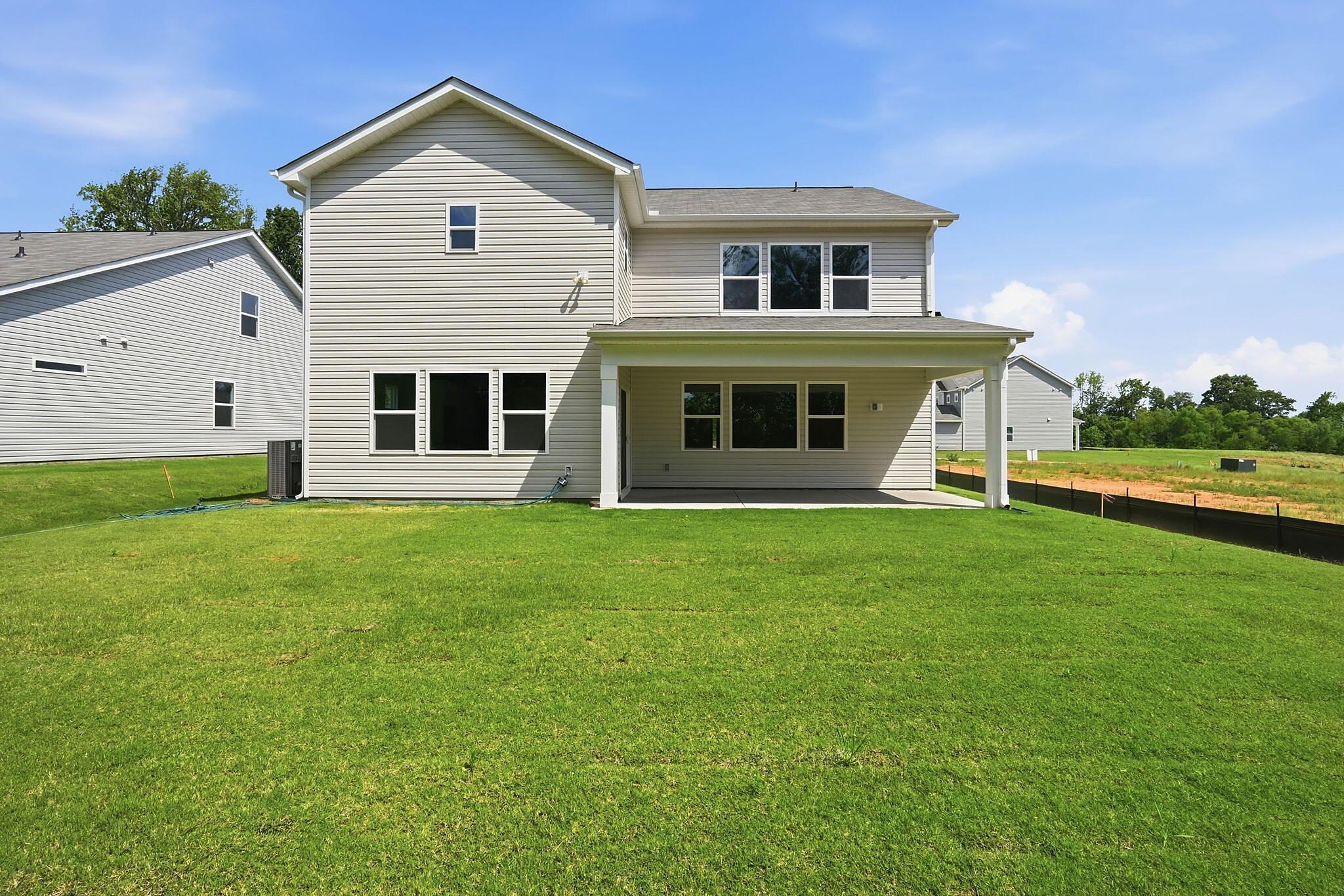 Back of Home with Covered Patio