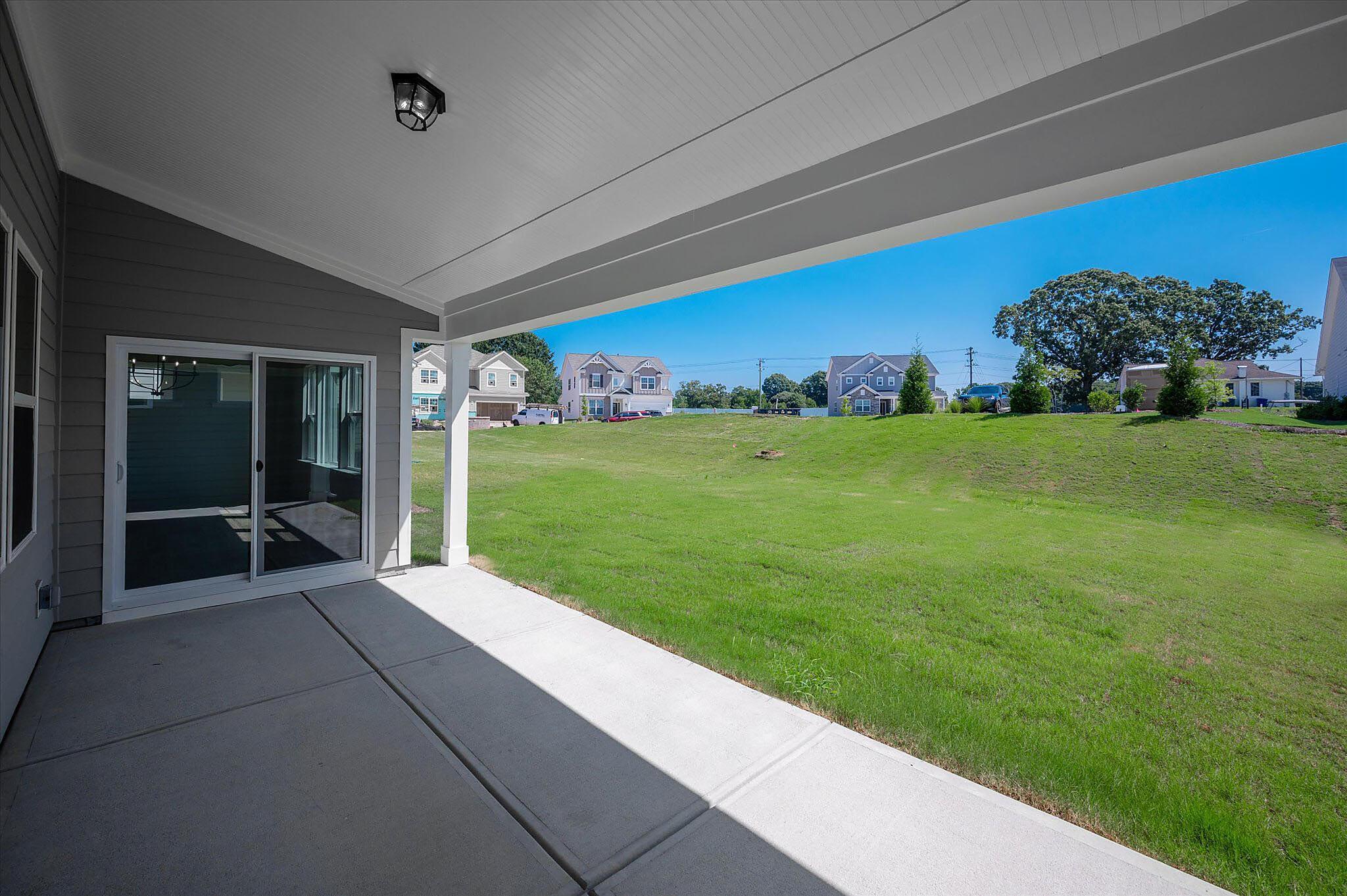 Rear Covered Patio & Backyard Views