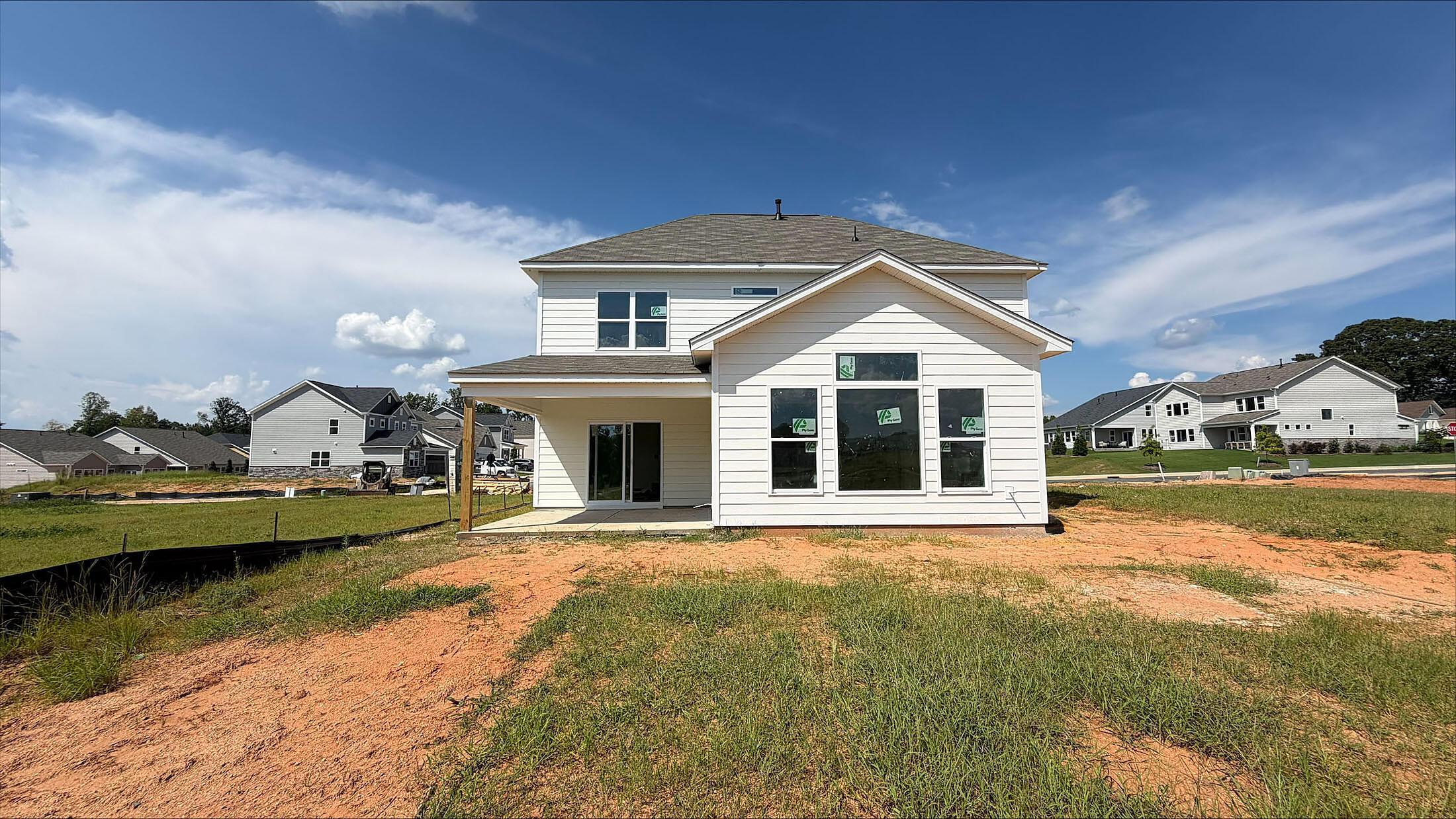 Back of Home with Covered Patio