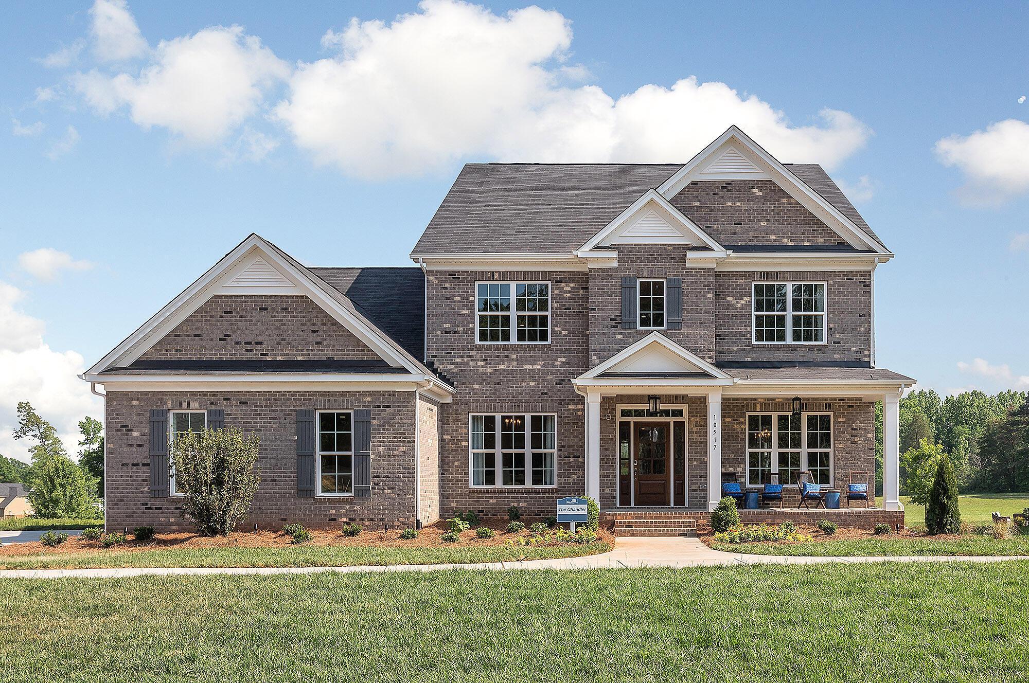 A Elevation w/ brick & side entry grg