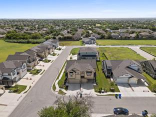 The Abbey: Carport - Villas at Rowe: Pflugerville, Texas - Empire Homes