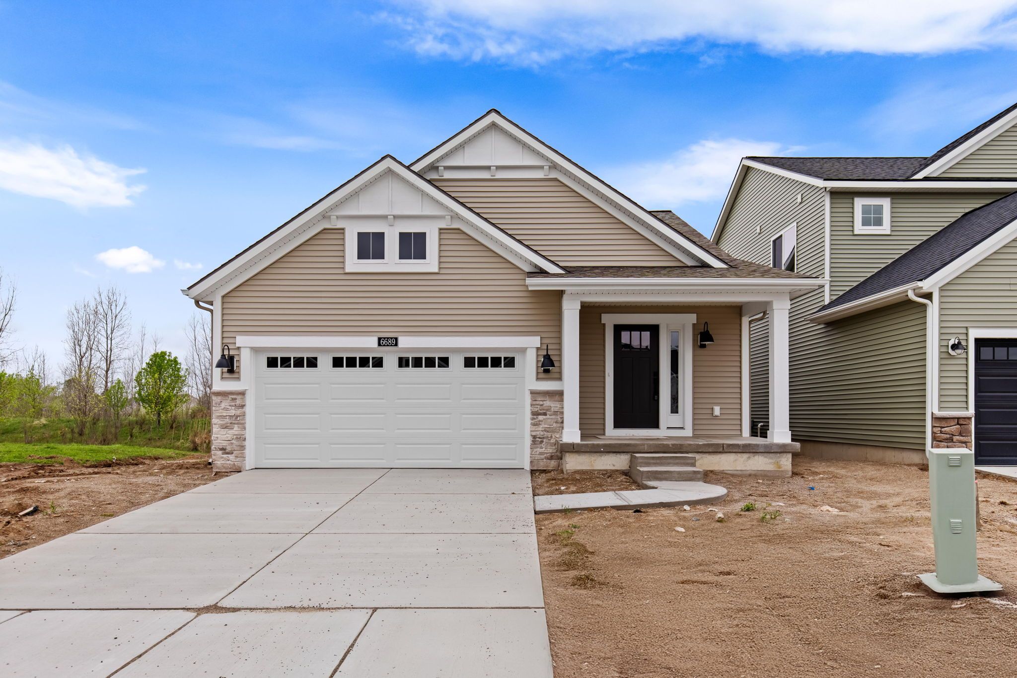 Village Place por Eastbrook Homes Inc. en Lansing Michigan
