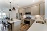casa en Bellevue Townhomes por Eastwood Homes
