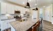 casa en Running Brooke Townes por Eastwood Homes
