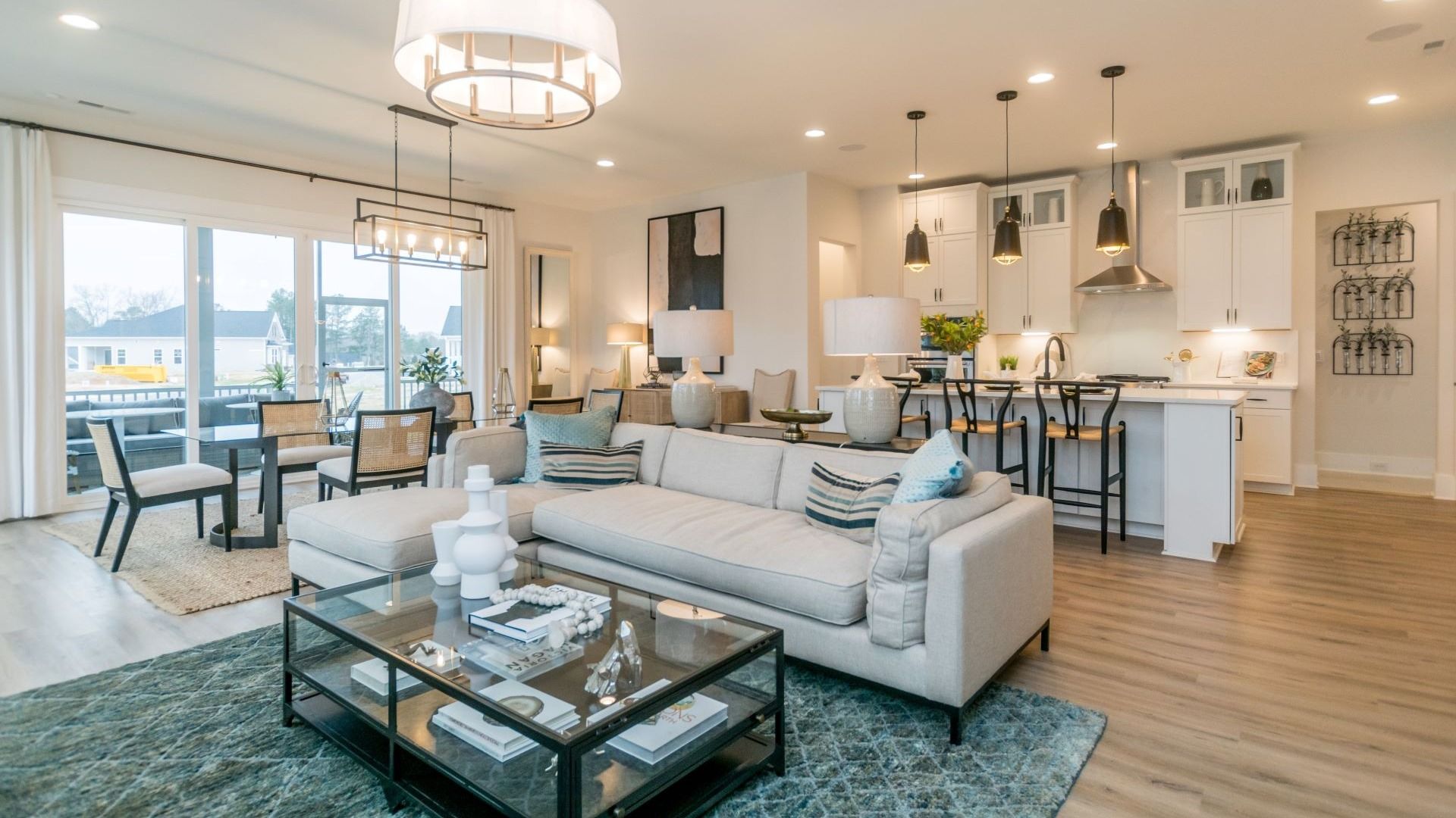 The Curator Plan by DBR Homes kitchen and living area with modern features in Fort Mill, SC.