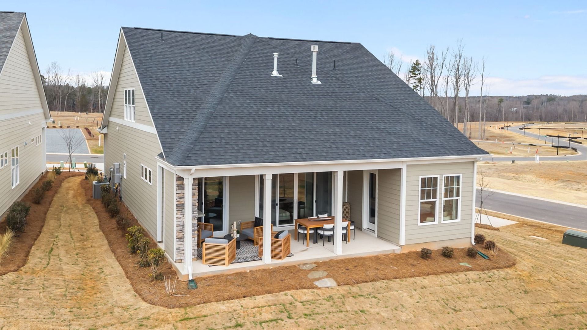 The Enthusiast Plan by DBR Homes with a spacious rear porch in Fort Mill, SC