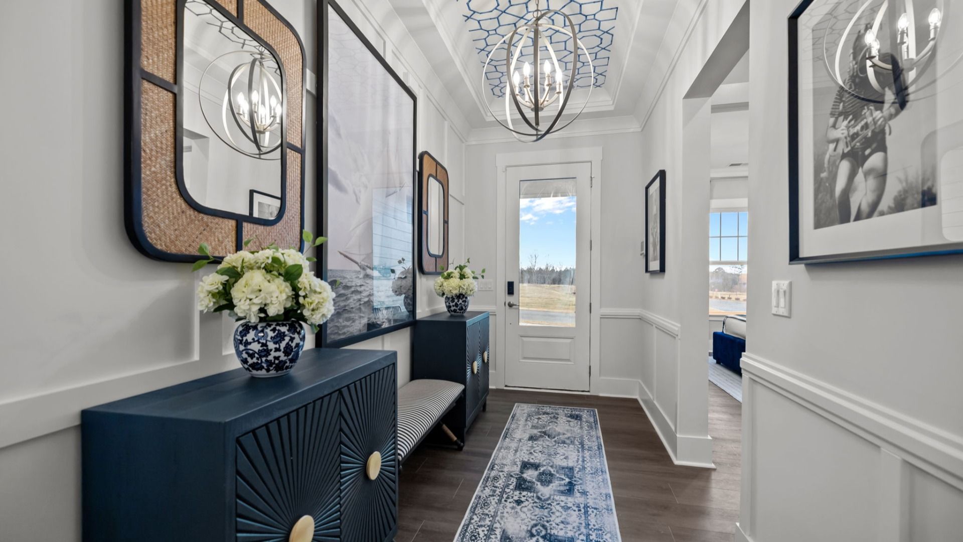 The Adventurer Plan by DBR Homes a bright and welcoming home entryway in Fort Mill, SC