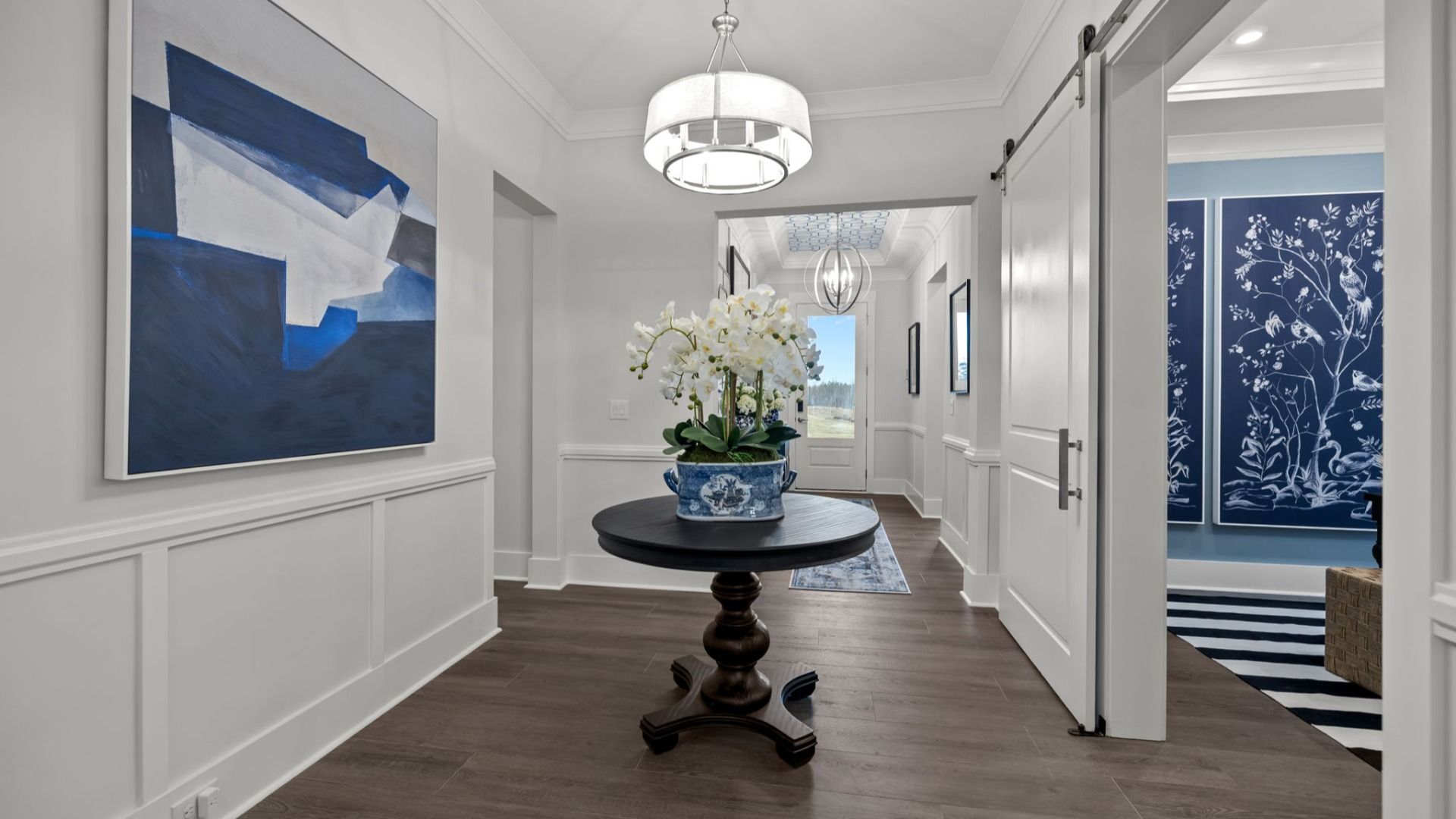 The Adventurer Plan by DBR Homes a bright and welcoming home entryway in Fort Mill, SC