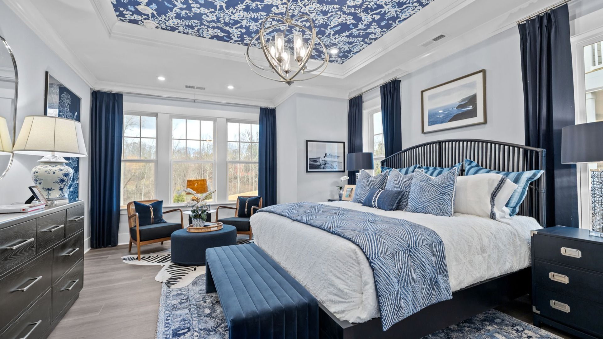 The Adventurer Plan by DBR Homes luxury primary suite with coffered ceilings in Fort Mill, SC.