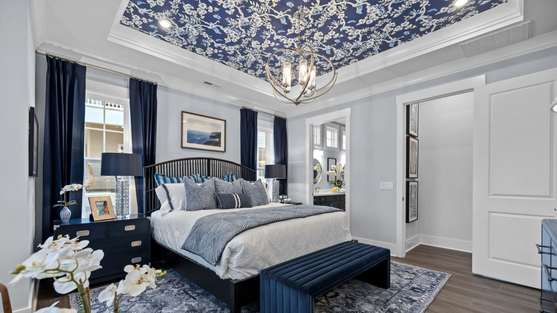 The Adventurer Plan by DBR Homes luxury primary suite with coffered ceilings in Fort Mill, SC.