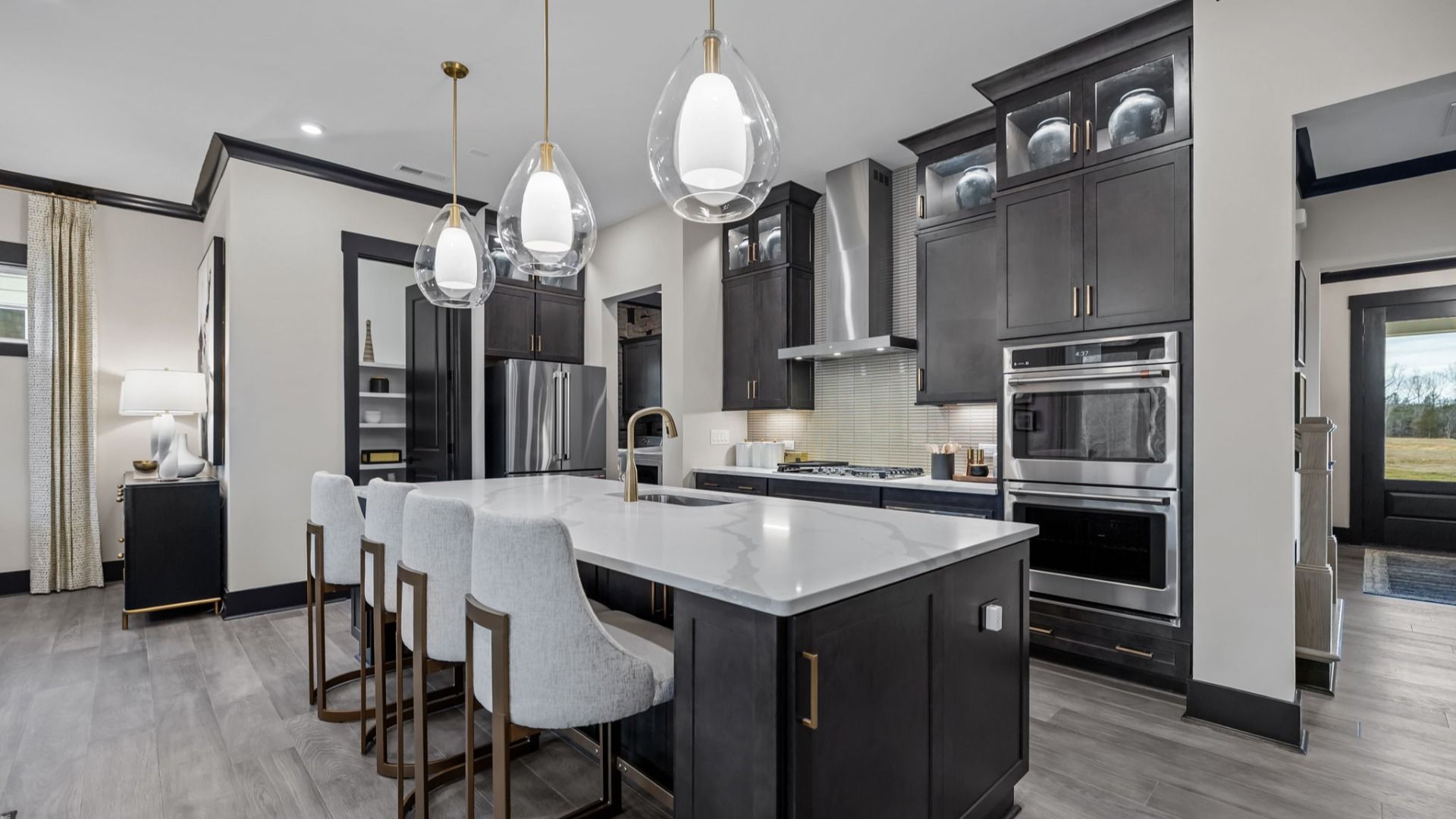 The Enthusiast Plan by DBR Homes kitchen with modern features in Fort Mill, SC.