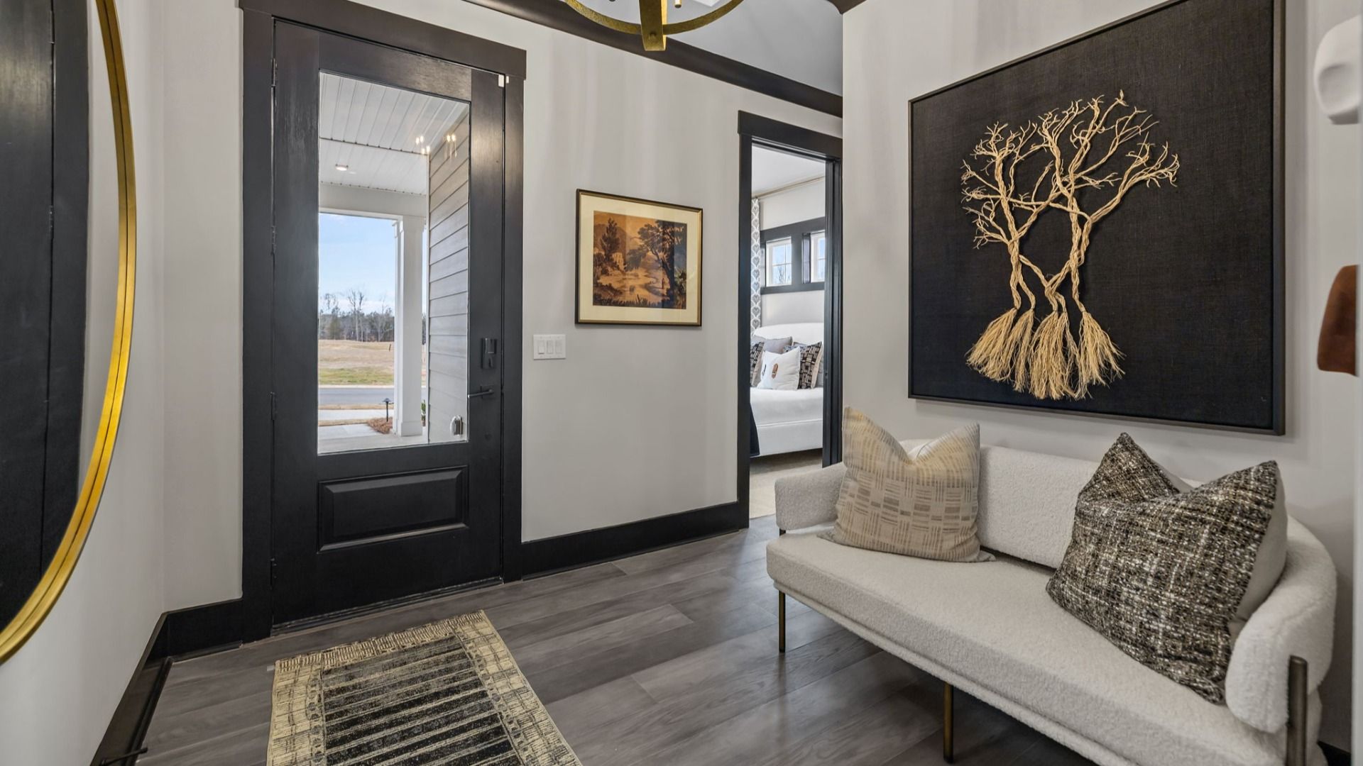 The Enthusiast Plan by DBR Homes a modern home entryway in Fort Mill, SC