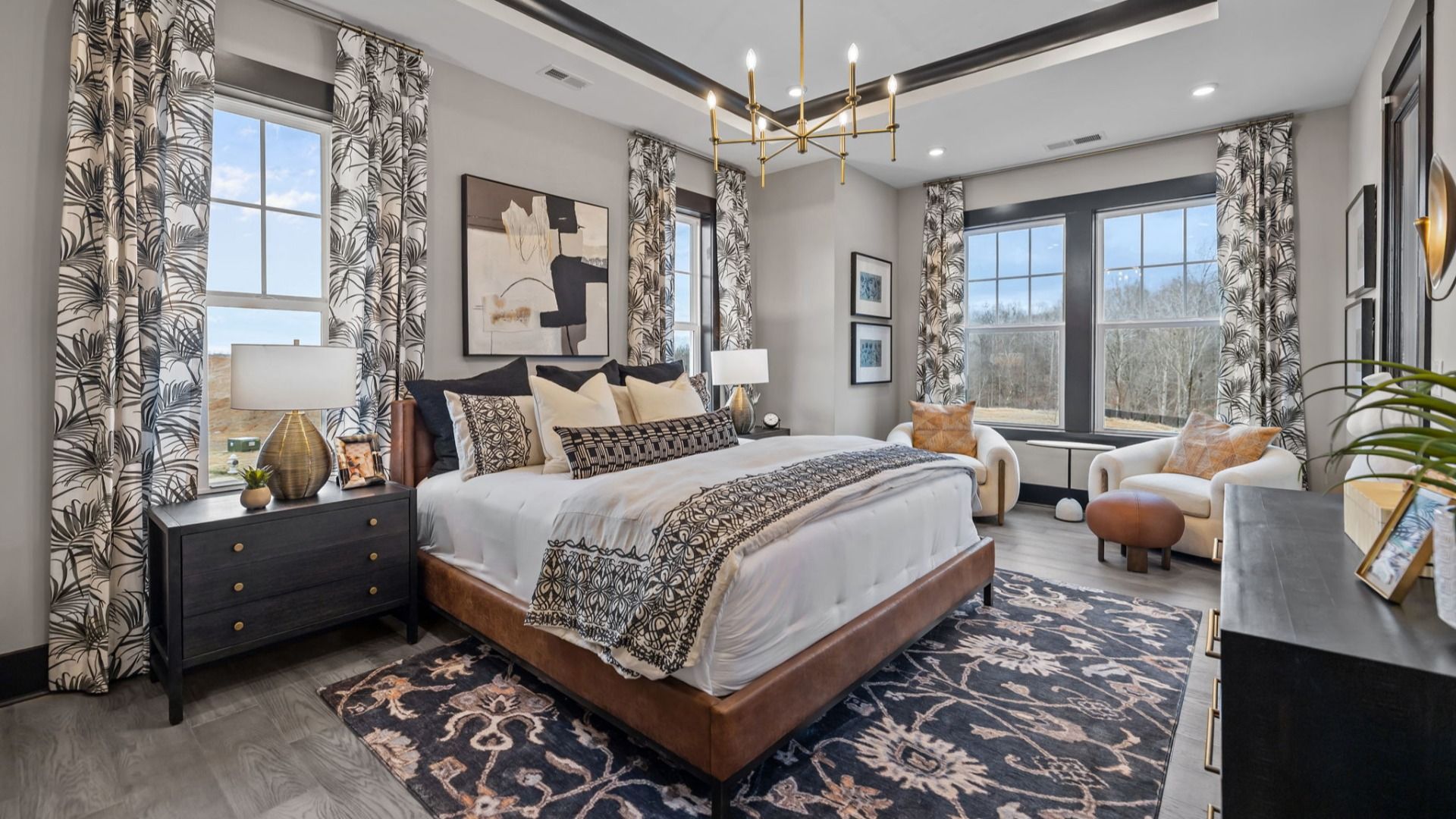 The Enthusiast Plan by DBR Homes luxury primary suite with coffered ceilings in Fort Mill, SC.