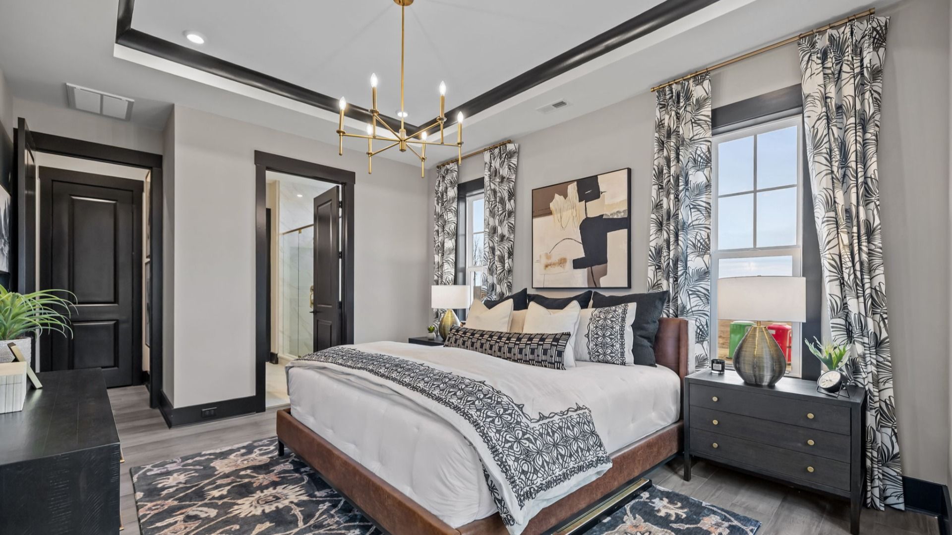 The Enthusiast Plan by DBR Homes luxury primary suite with coffered ceilings in Fort Mill, SC.