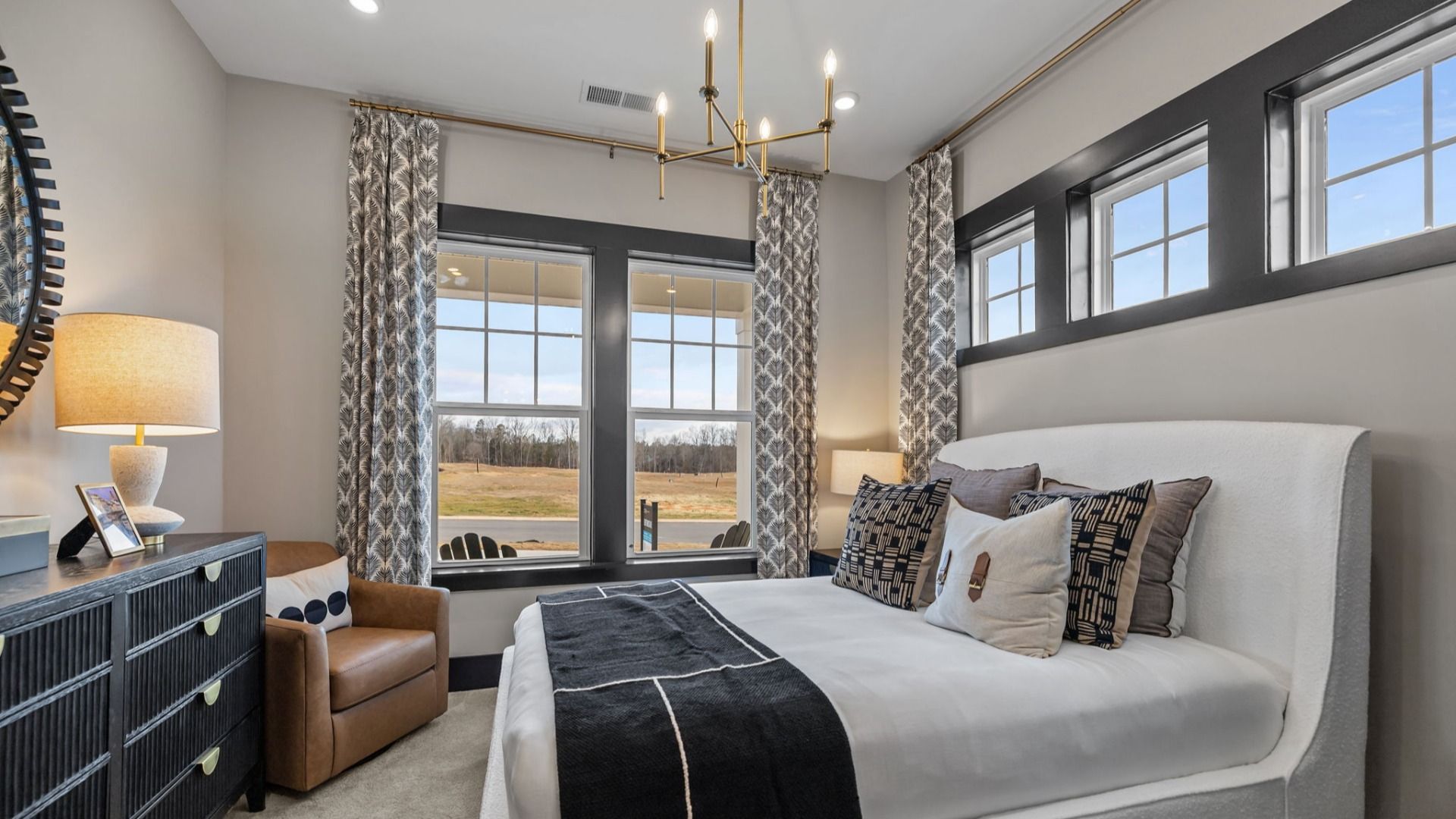 The Enthusiast Plan by DBR Homes with a secondary bedroom in Fort Mill, SC
