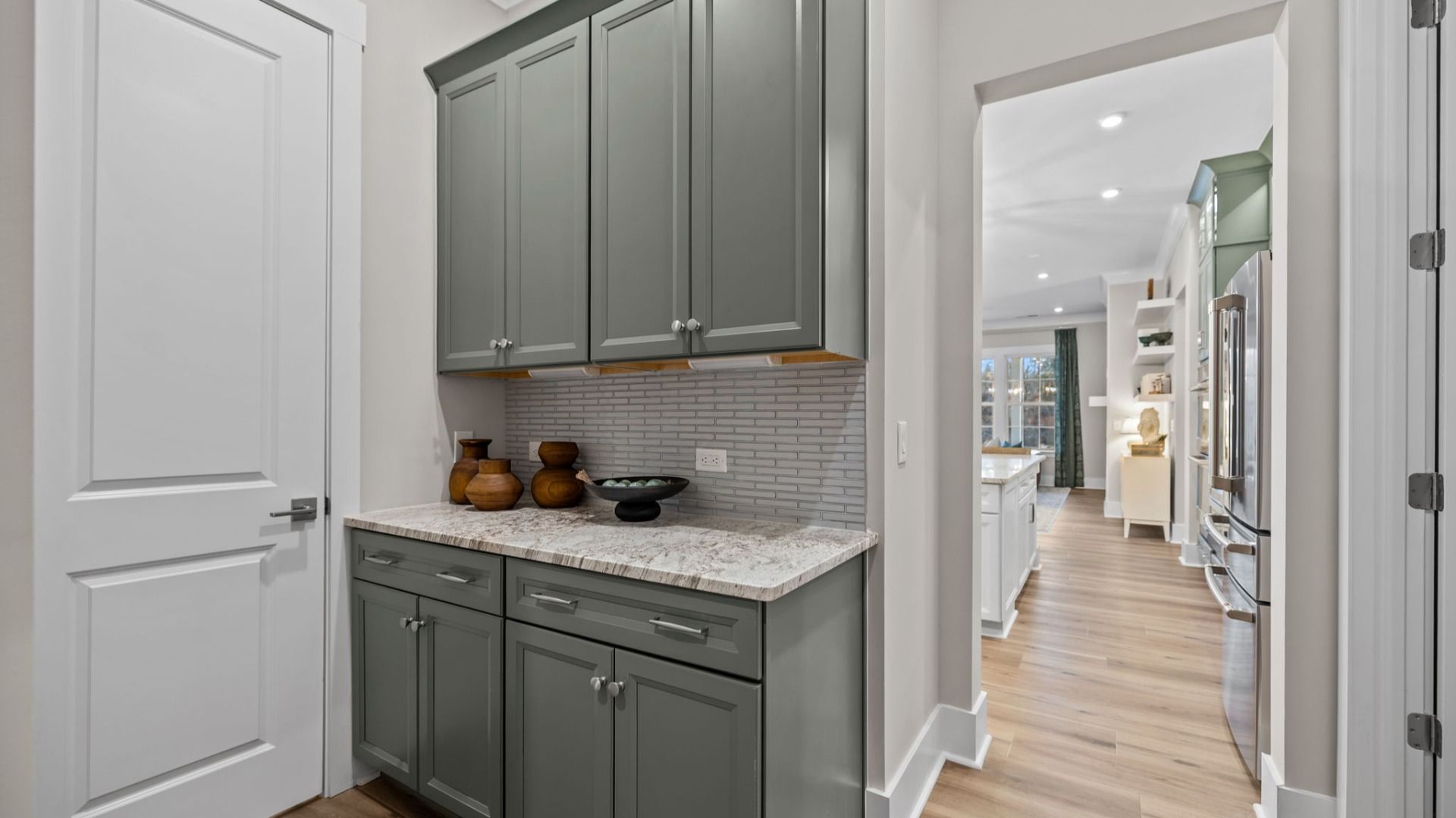The Inspire Plan by DBR Homes kitchen with butler's pantry in Fort Mill, SC.