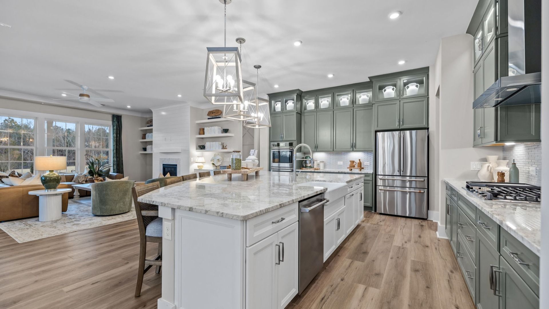 The Inspire Plan by DBR Homes kitchen with an oversized corner island modern cabinets and features in Fort Mill, SC.