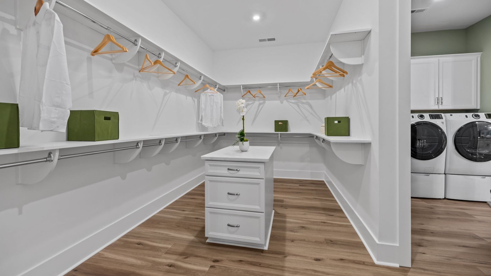 The Inspire Plan walk in closet with closet island in Fort Mill, SC