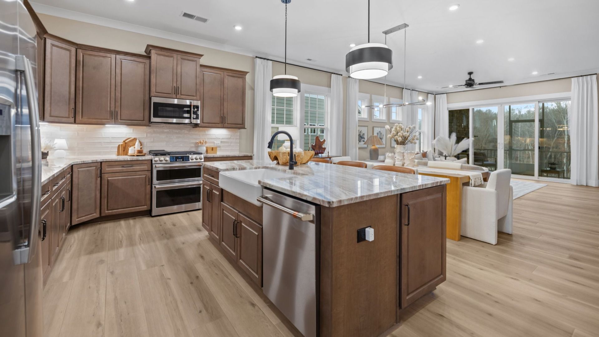 The Virtuoso Plan by DBR Homes kitchen with modern cabinets and black features in Fort Mill, SC.