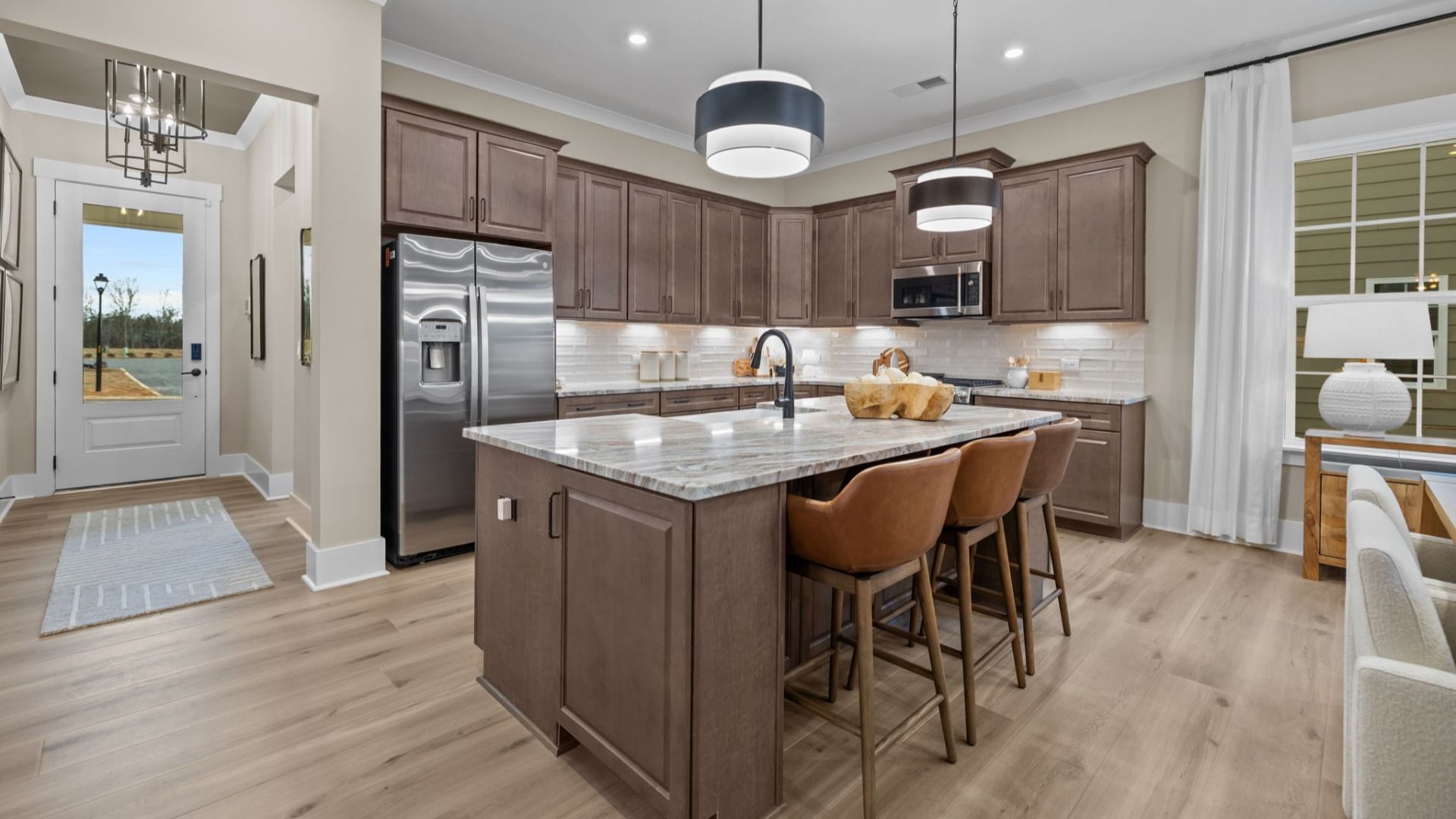 The Virtuoso Plan by DBR Homes kitchen with modern cabinets and black features in Fort Mill, SC.
