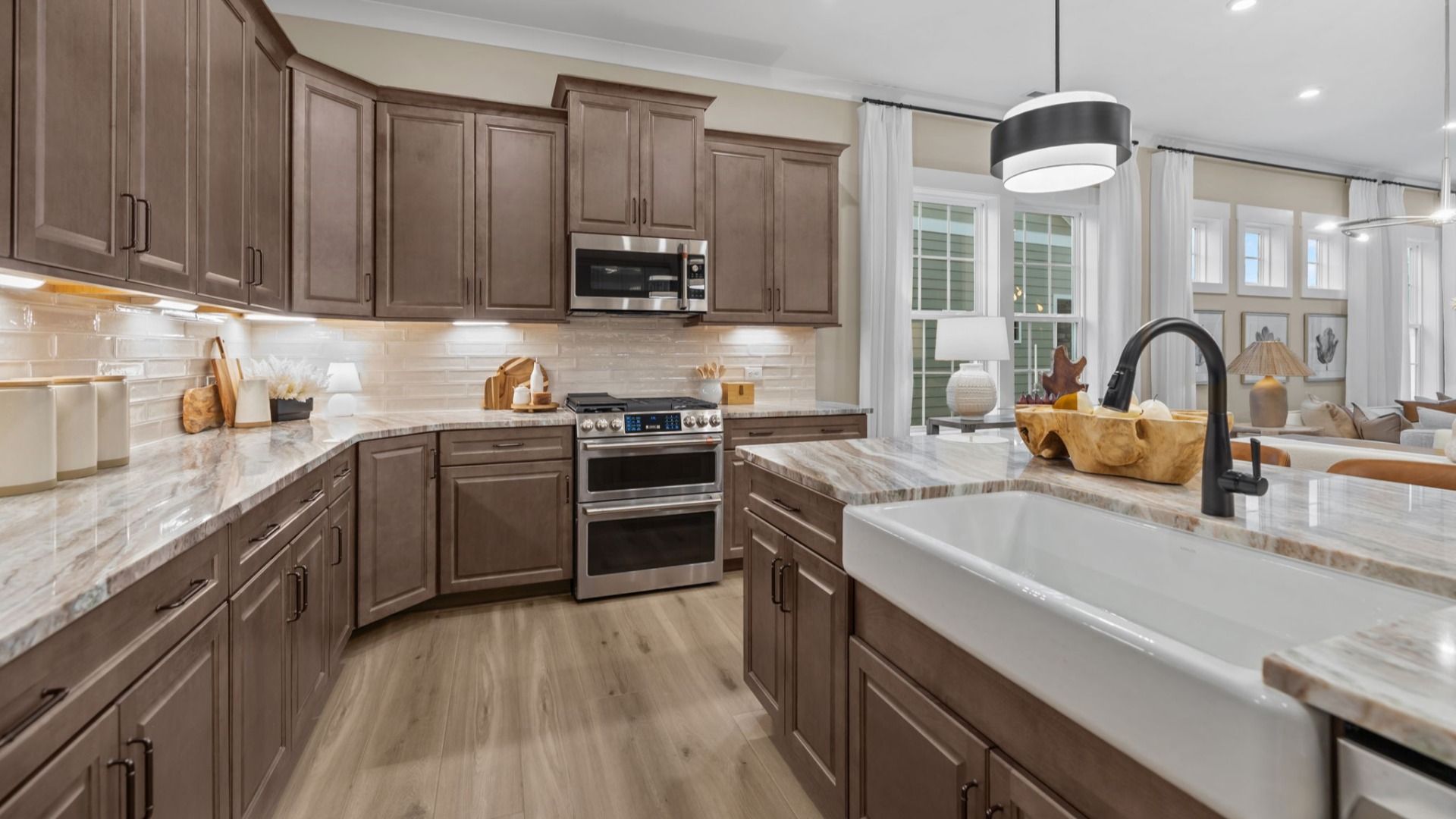 The Virtuoso Plan by DBR Homes kitchen with modern cabinets and black features in Fort Mill, SC.