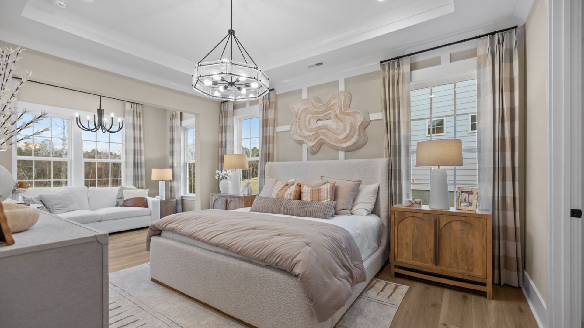 The Virtuoso Plan by DBR Homes luxury primary suite with coffered ceilings in Fort Mill, SC.