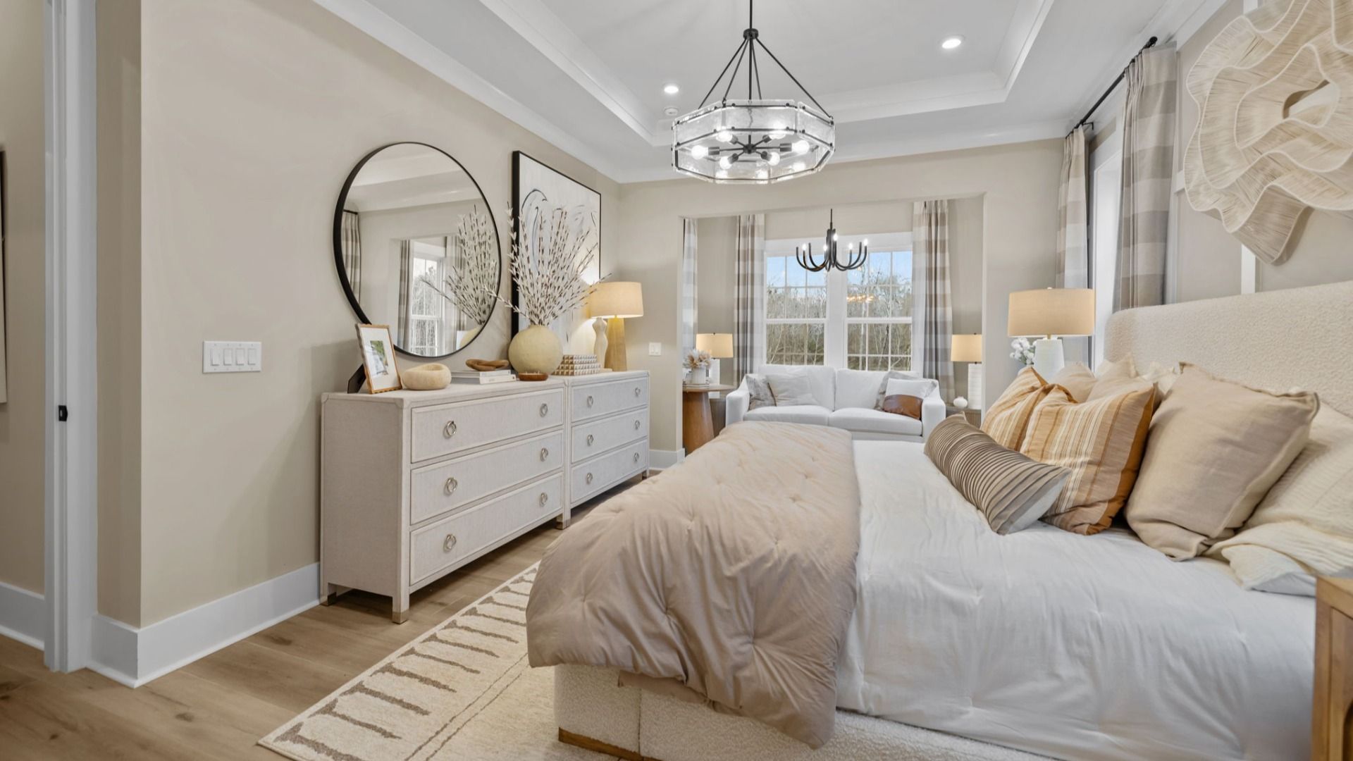 The Virtuoso Plan by DBR Homes luxury primary suite with coffered ceilings in Fort Mill, SC.