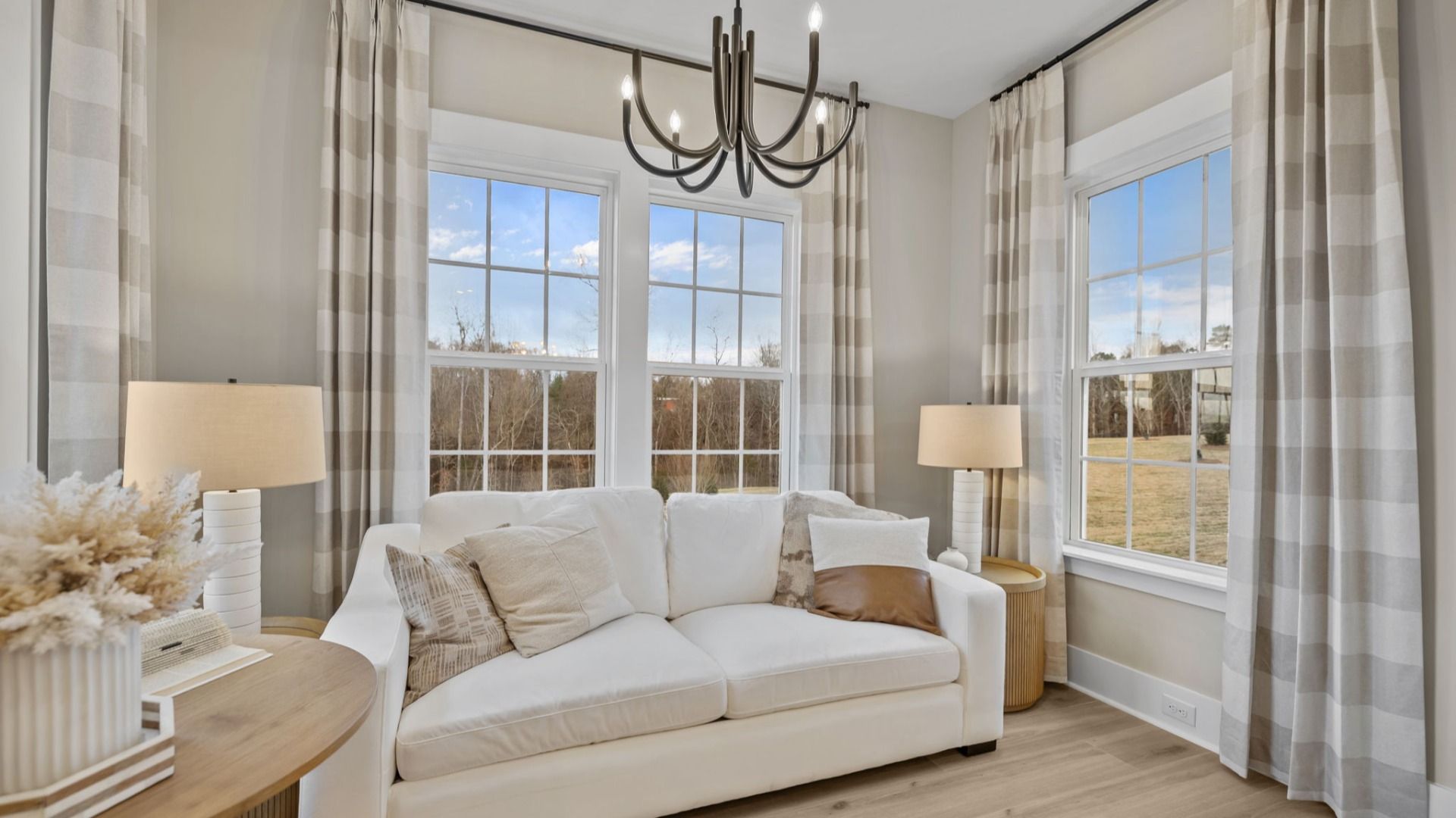 The Virtuoso Plan by DBR Homes luxury primary sitting room in Fort Mill, SC.