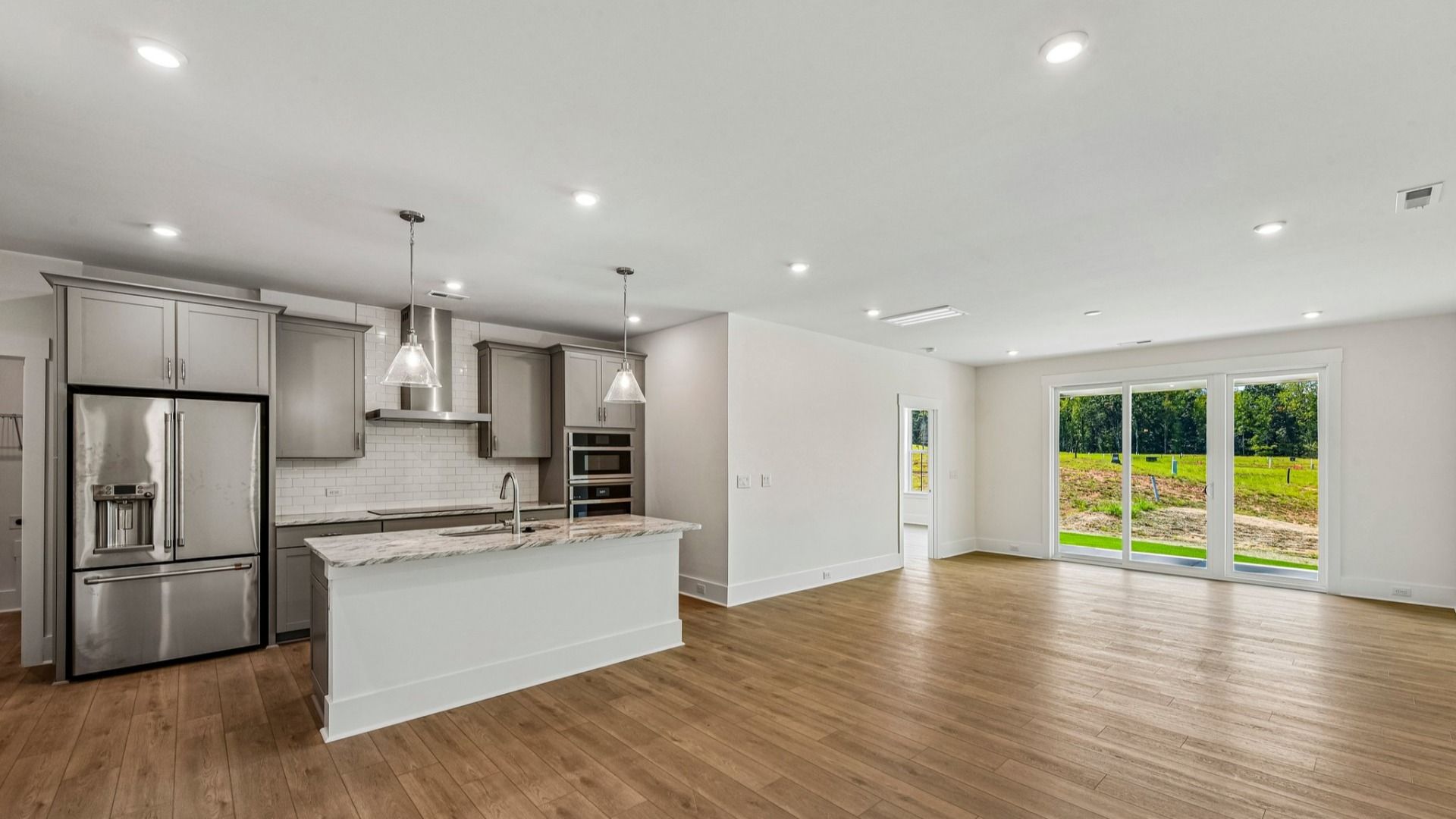 The Connect Plan by DRB Elevate in Fort Mill, NC - Kitchen & Living Space