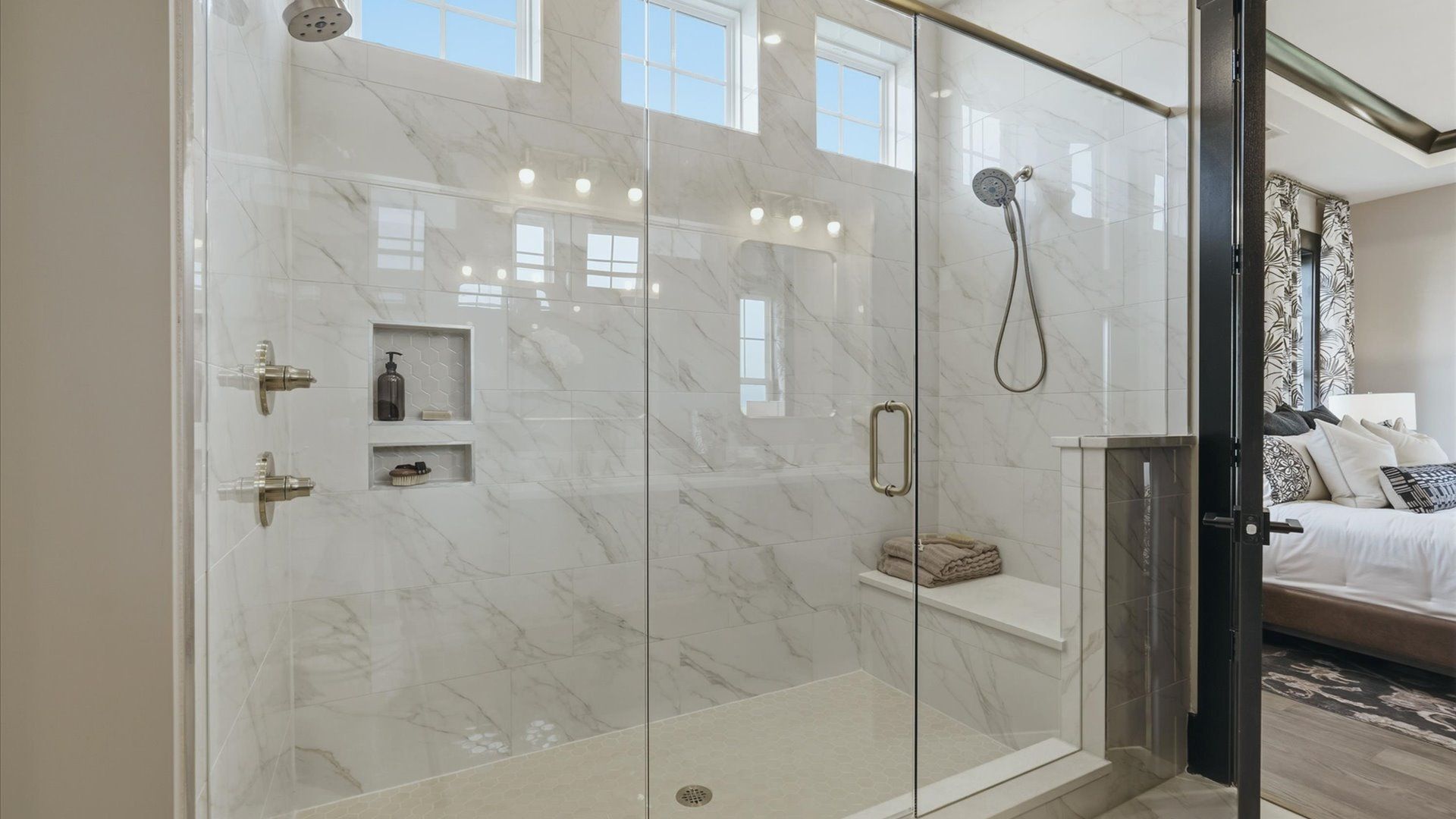 The Enthusiast Plan by DRB homes in Brook Run Fort Mill, NC - Primary Bathroom with Roman shower
