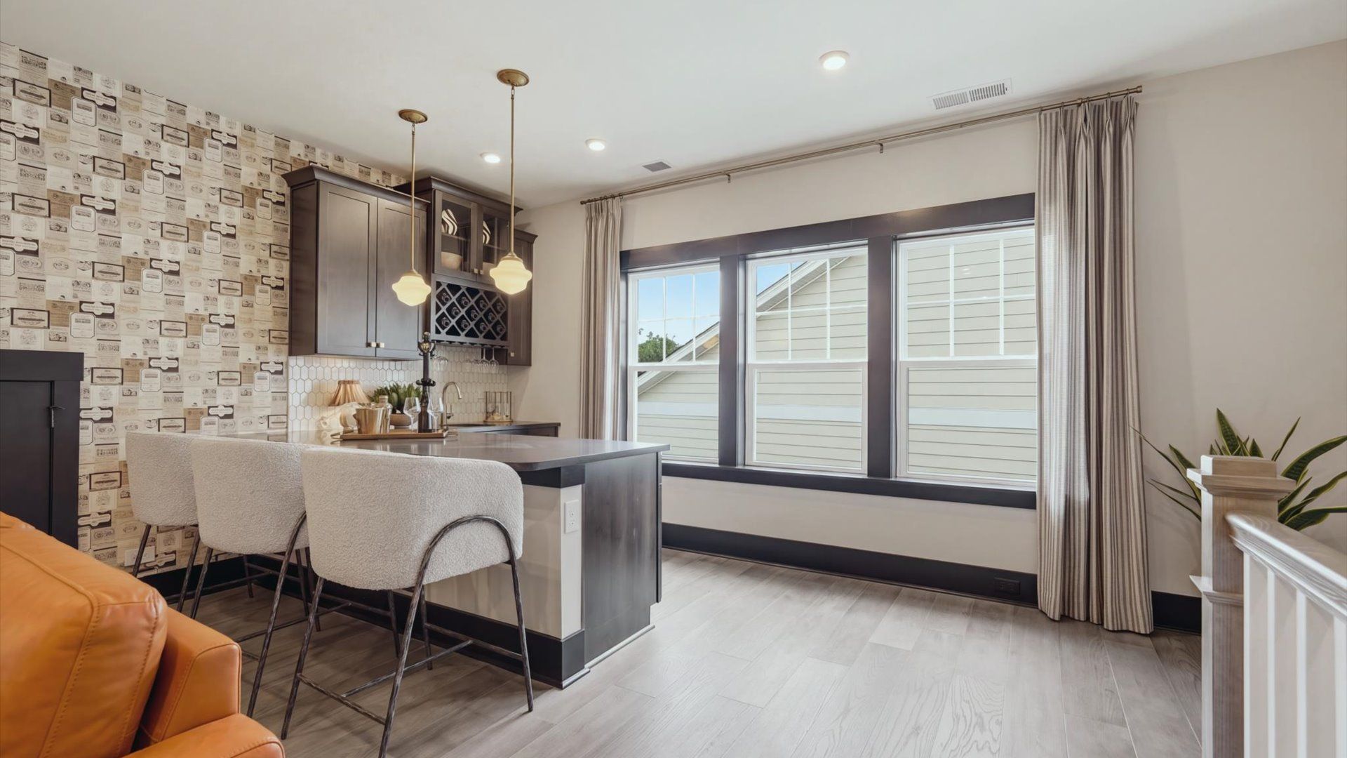 The Enthusiast Plan by DRB homes in Brook Run Fort Mill, NC - Loft with Wet bar