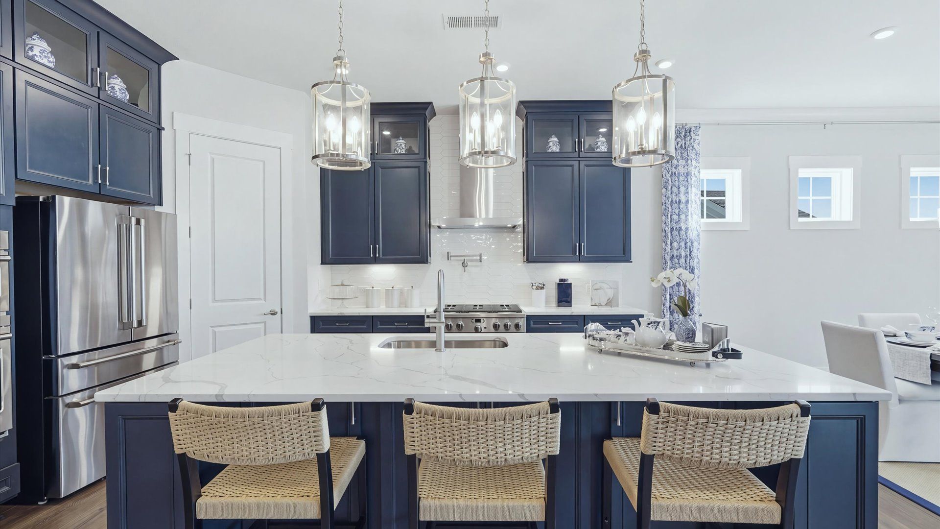 The Adventurer Plan by DRB Homes - Elevate in Brook Run Fort Mill, SC - Kitchen island with additional storage