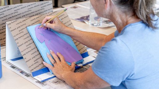 Join a clubhouse art class at Amblebrook and enjoy fun, relaxing activities with friends.