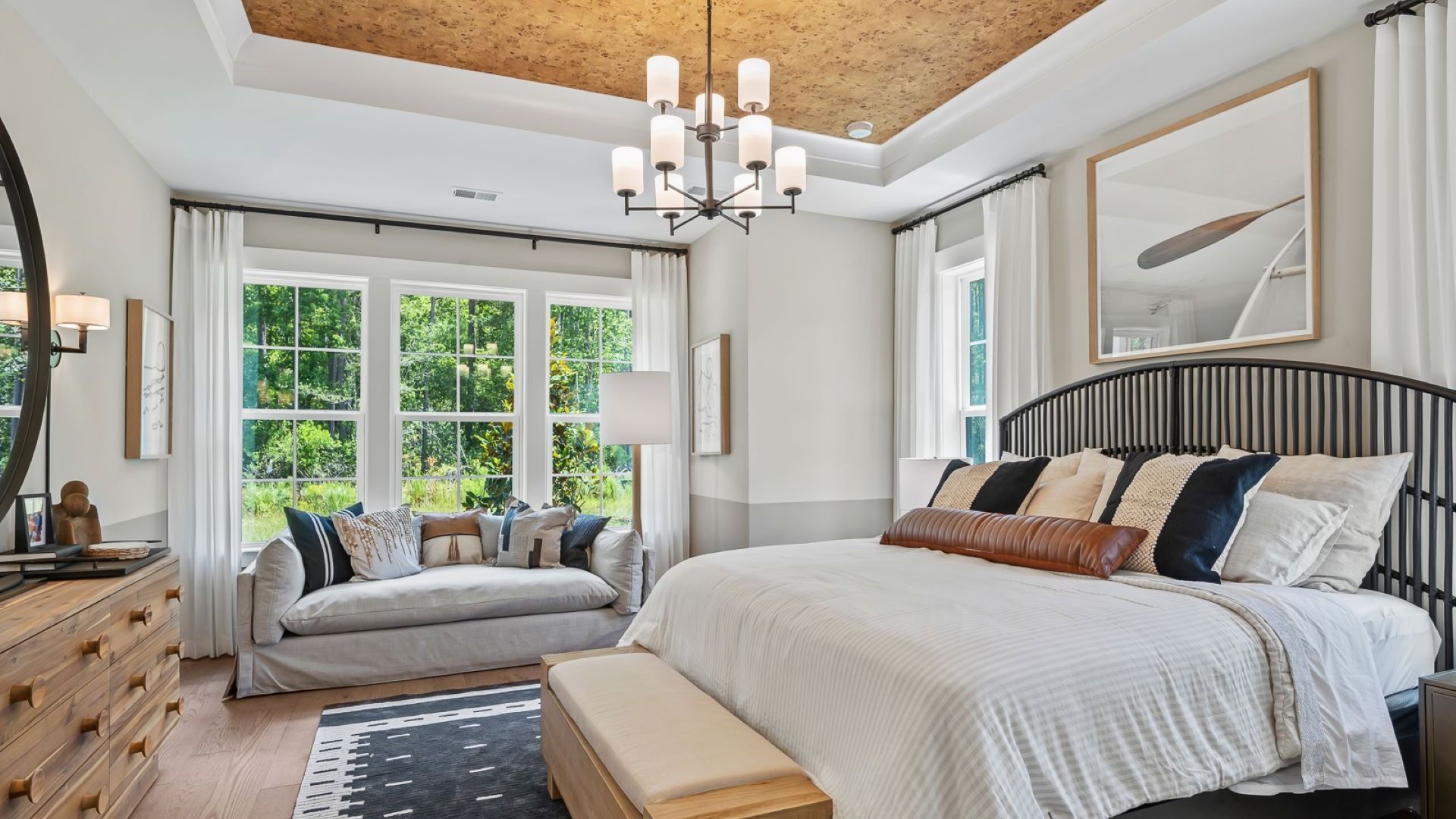 Summerwind Crossing at Lakes of Cane Bay owner's suite in new model home features amazing big windows and high ceilings