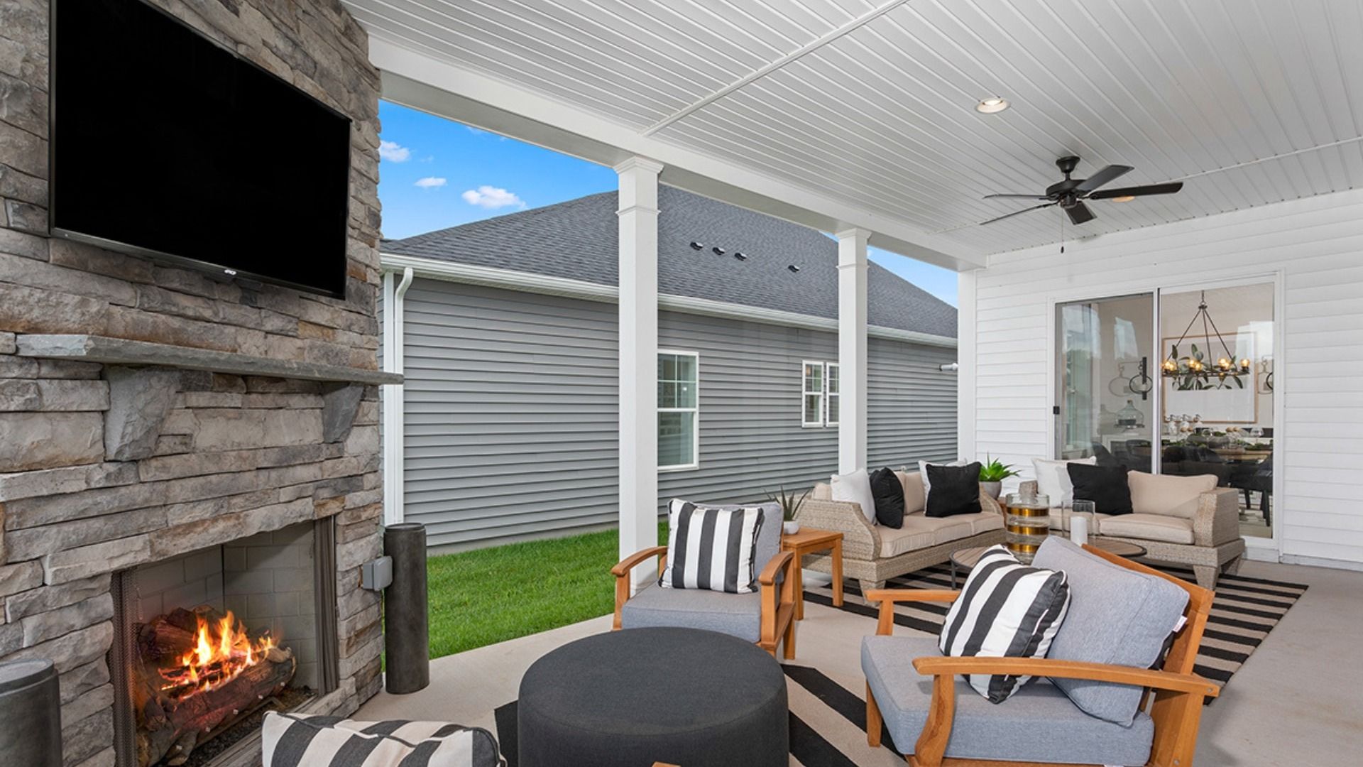 The patio off the Inspire floor plan’s gathering room creates the perfect space for outdoor comfort.