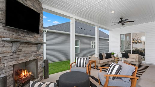 The patio off the Inspire floor plan’s gathering room creates the perfect space for outdoor comfort.