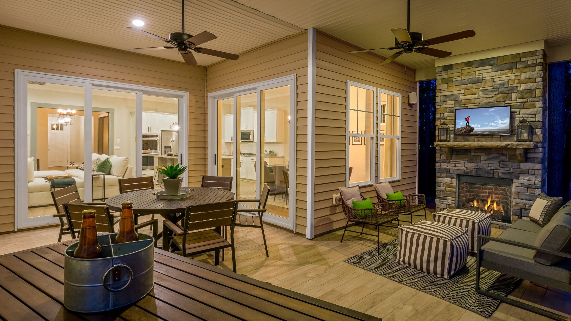 Spend a relaxing evening on the illuminated patio of the Adventurer floor plan by DRB Elevate.