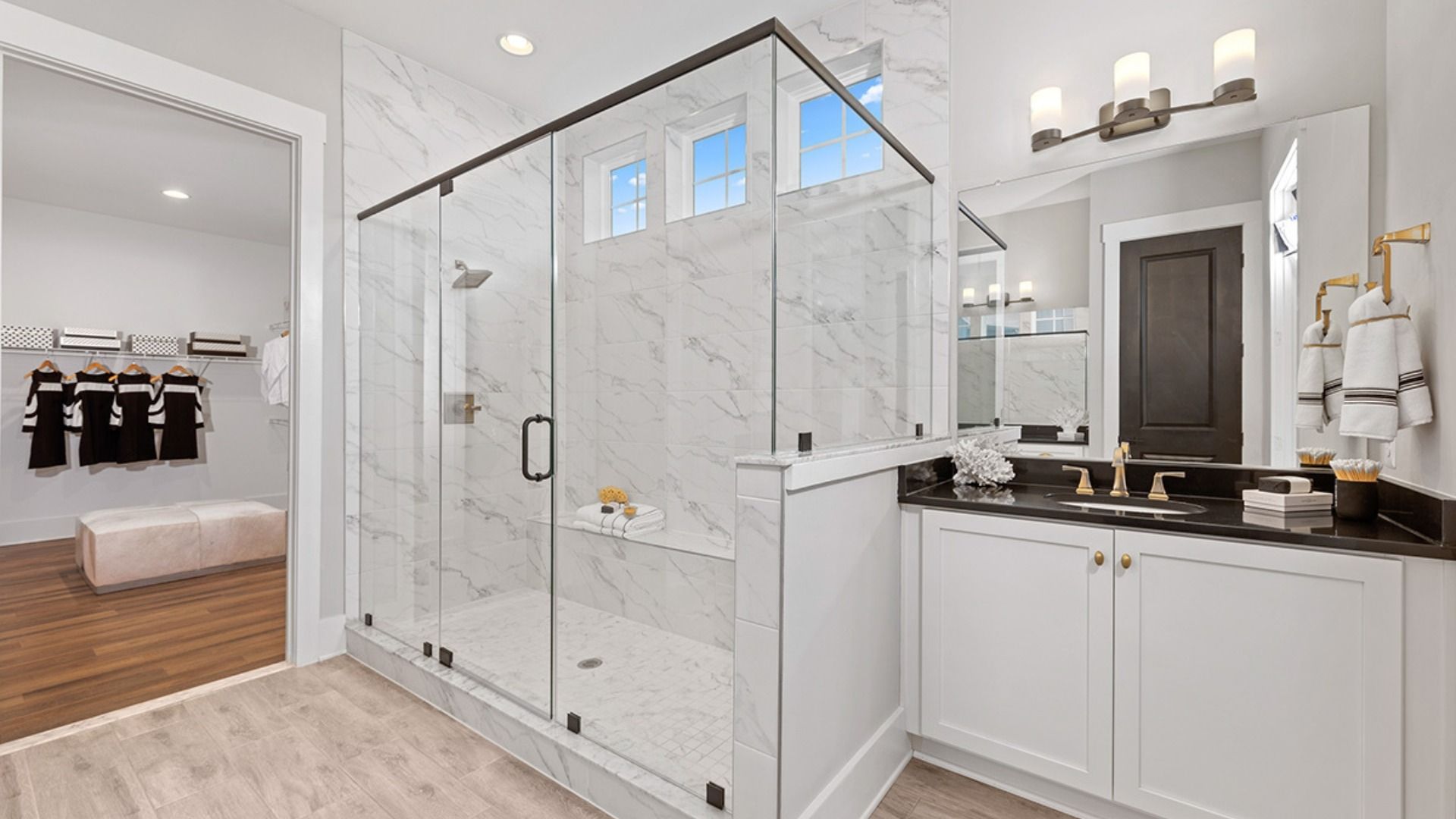 The DRB Elevate Unity floor plan features a spacious owner’s bathroom and a large walk-in closet.