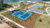 casa en Summerwind Crossing at Lakes of Cane Bay por DRB Elevate