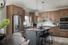 casa en Creekside Commons por Elite Built Homes LLC.