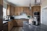 casa en Creekside Commons por Elite Built Homes LLC.