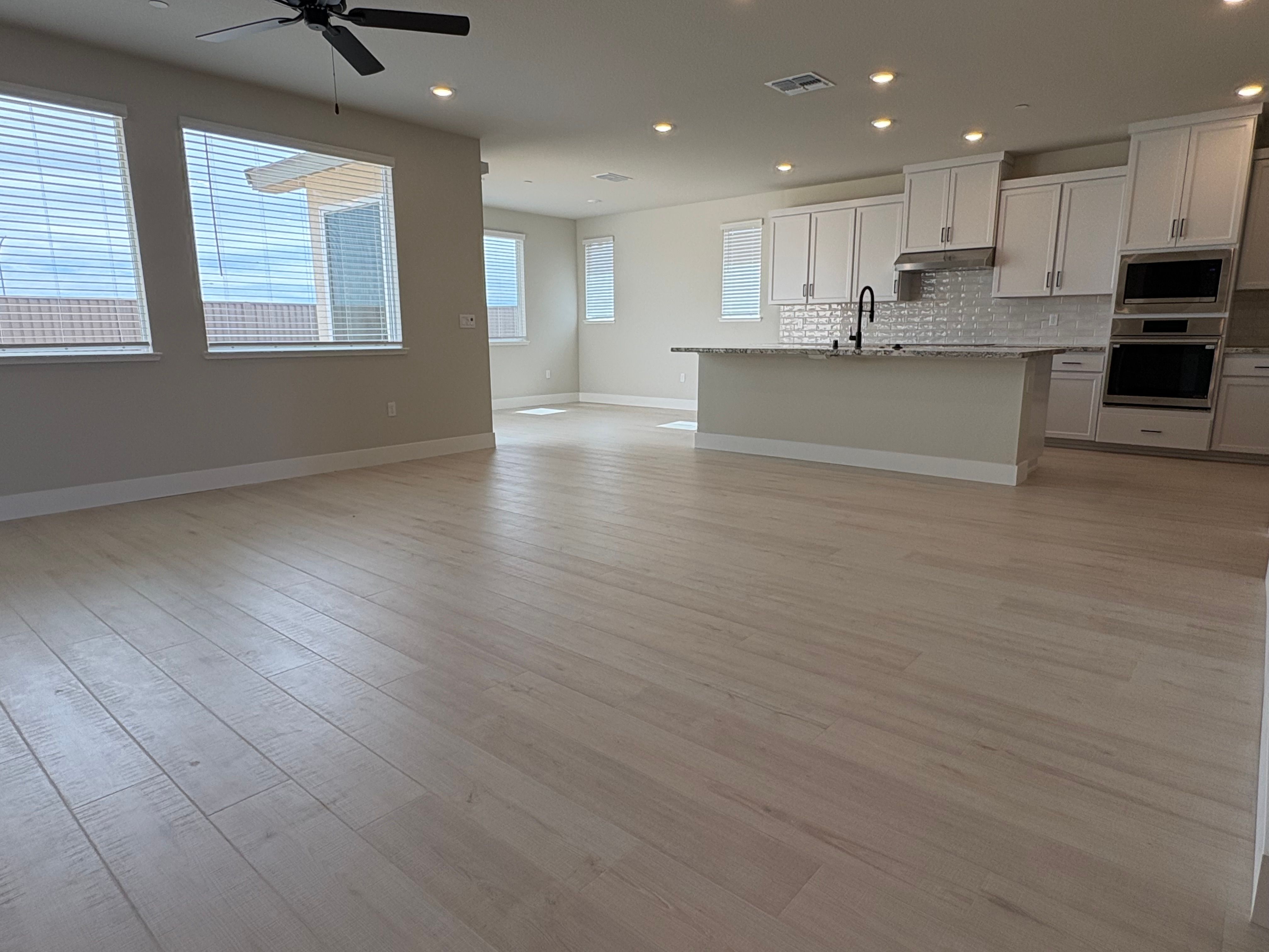 Great room, kitchen and dining area