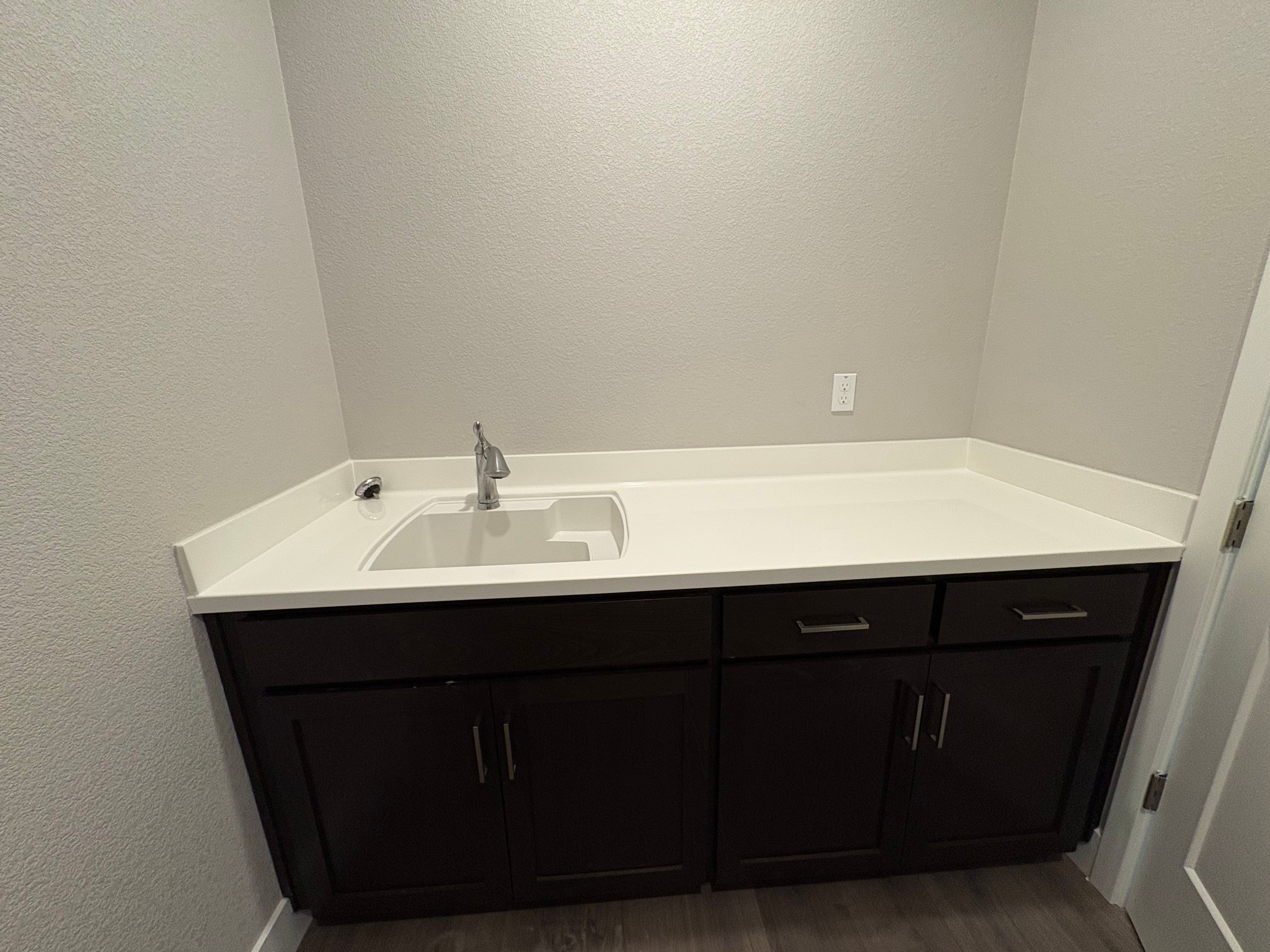 Laundry Room with Sink and Lower Cabinets