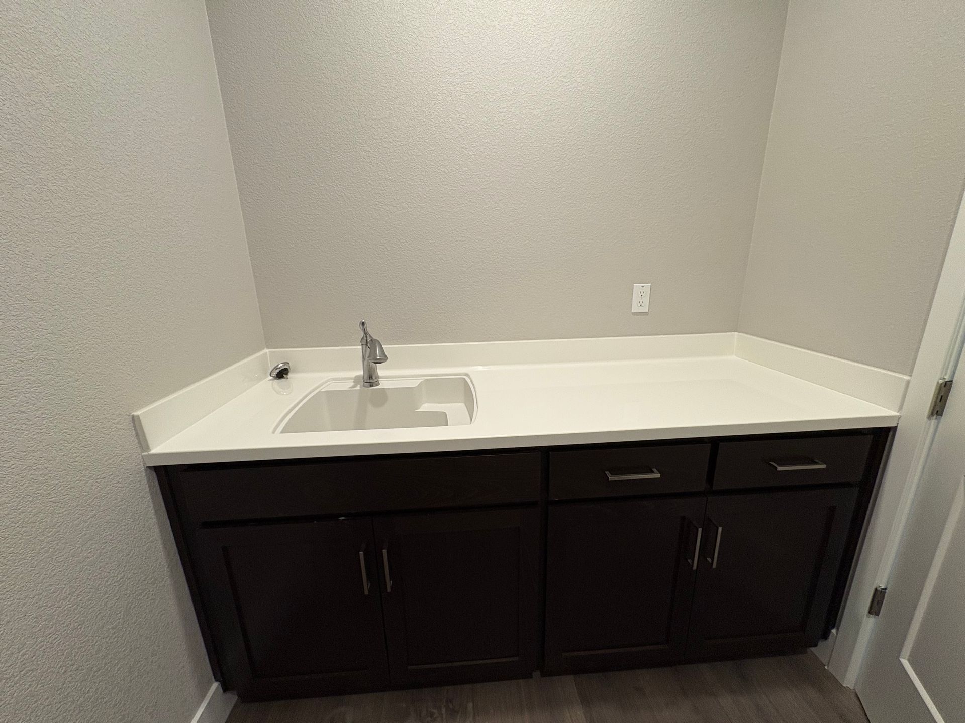 Laundry Room with Sink and Lower Cabinets