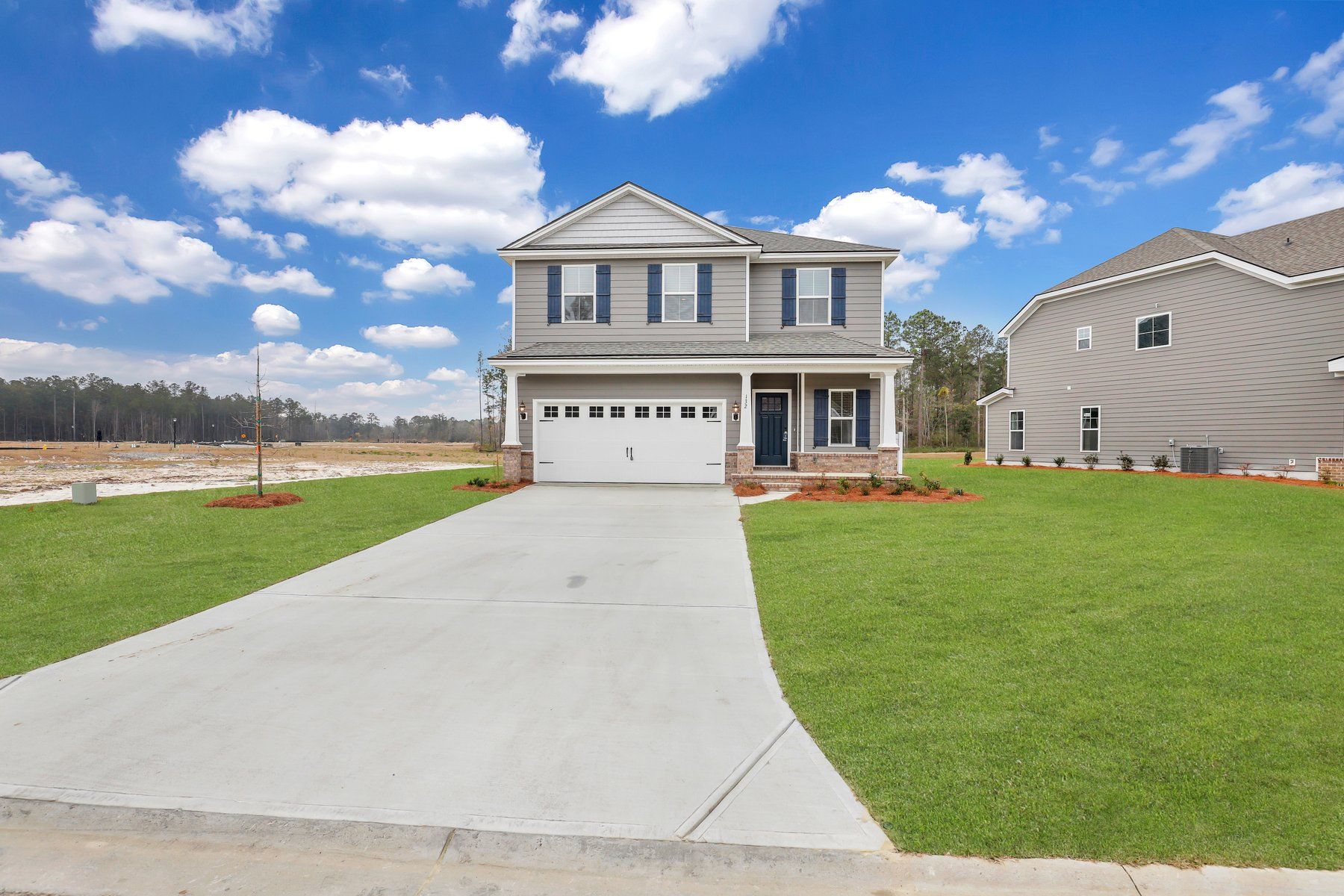 Seabrook Front Elevation C with Brick | Ernest Homes