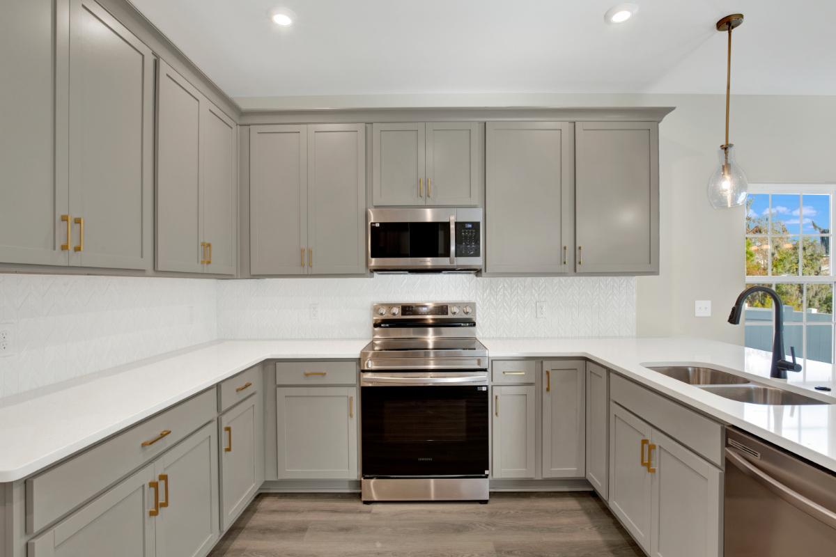 Oscar Mulberry Kitchen with Gray Cabinets – Ernest Homes