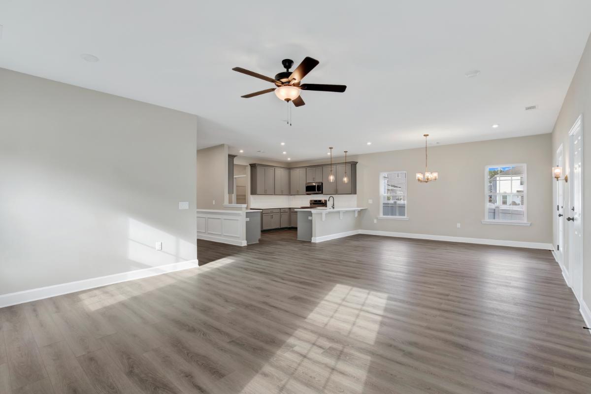Oscar Mulberry Open-Concept Living Area – Ernest Homes