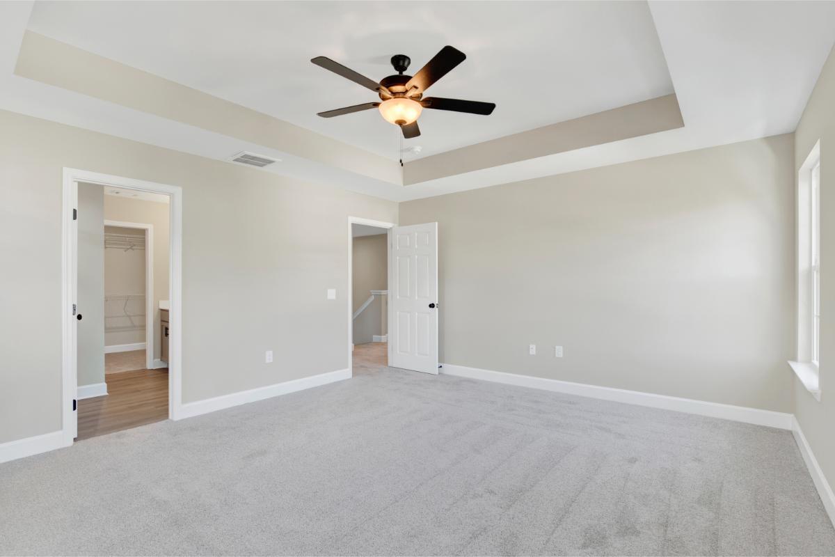 Oscar Mulberry Floor Plan | Primary Bedroom with Tray Ceiling and En Suite Access