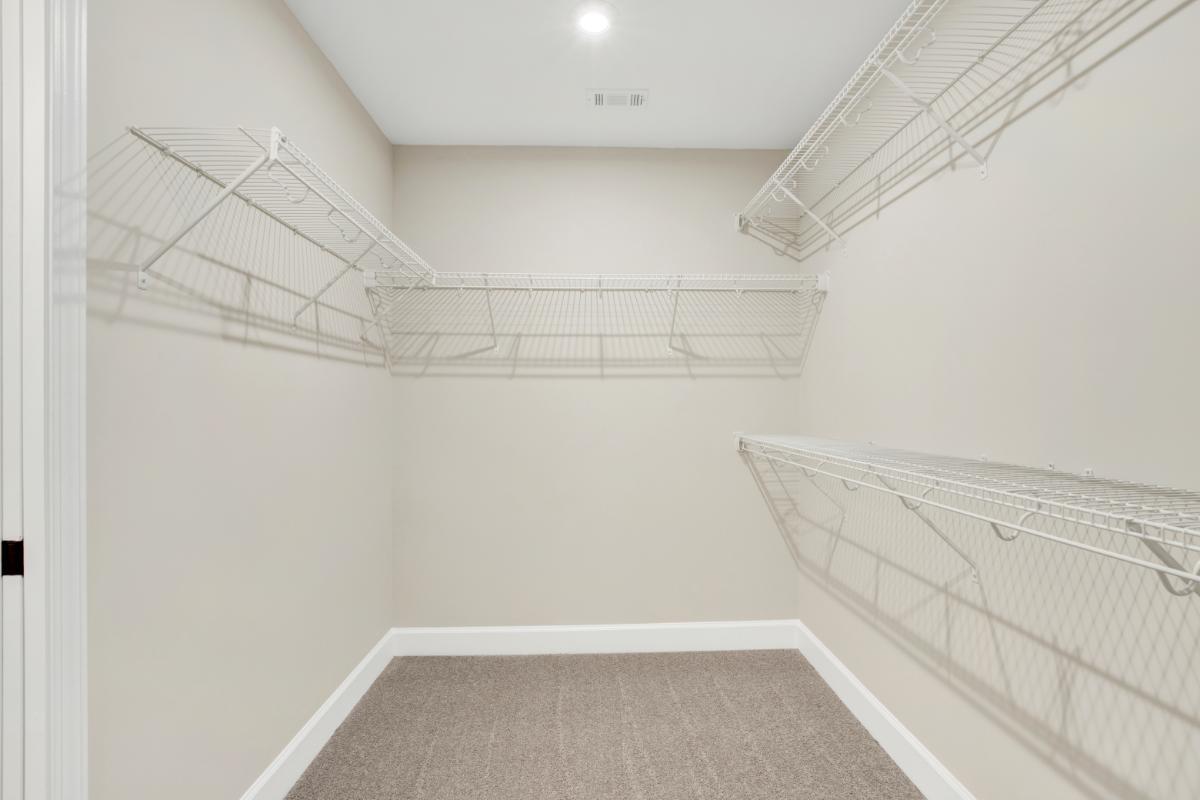 Oscar Mulberry Primary Walk-In Closet | 245 James Drive