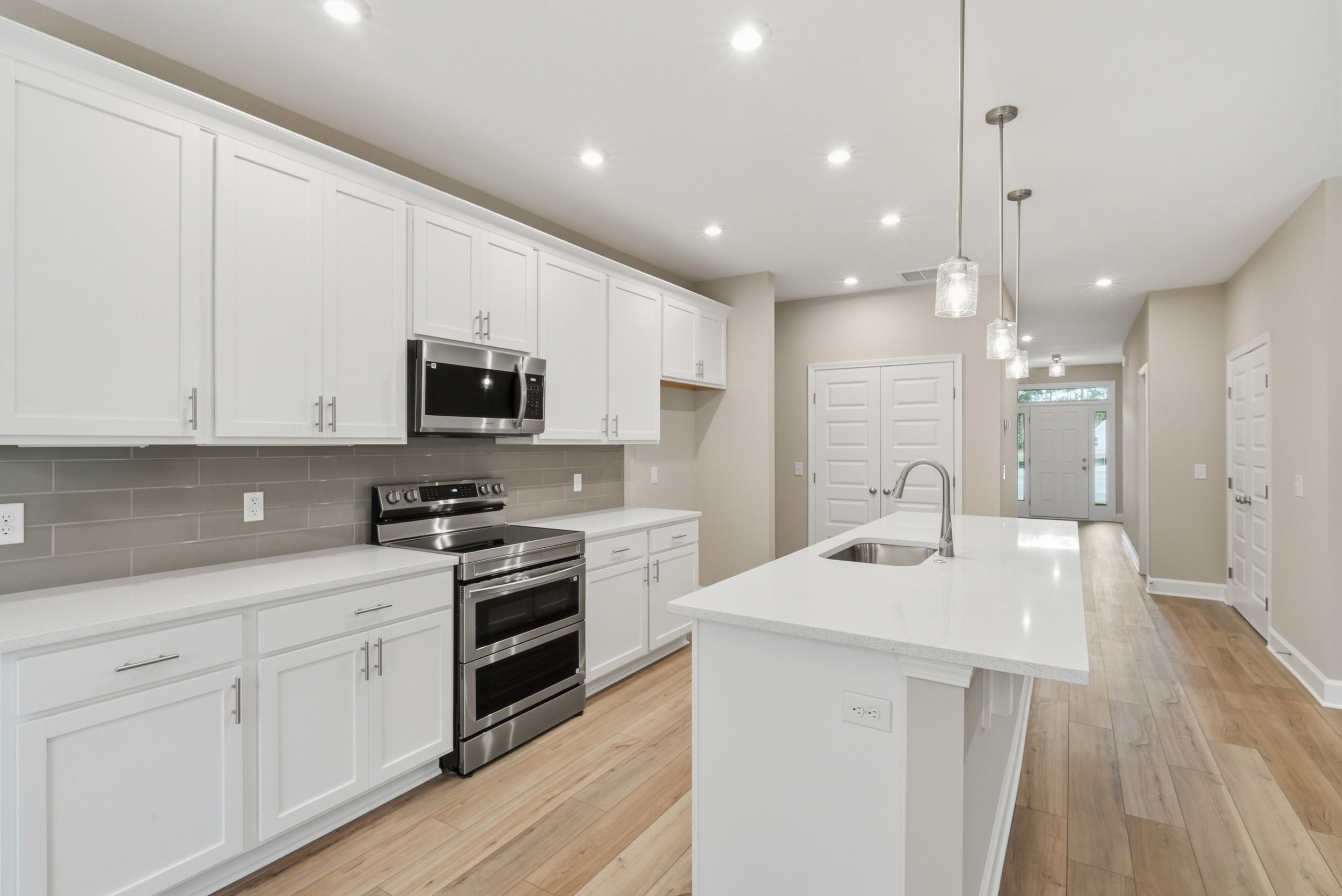 Harbor II Kitchen with White Cabinets and Large Island